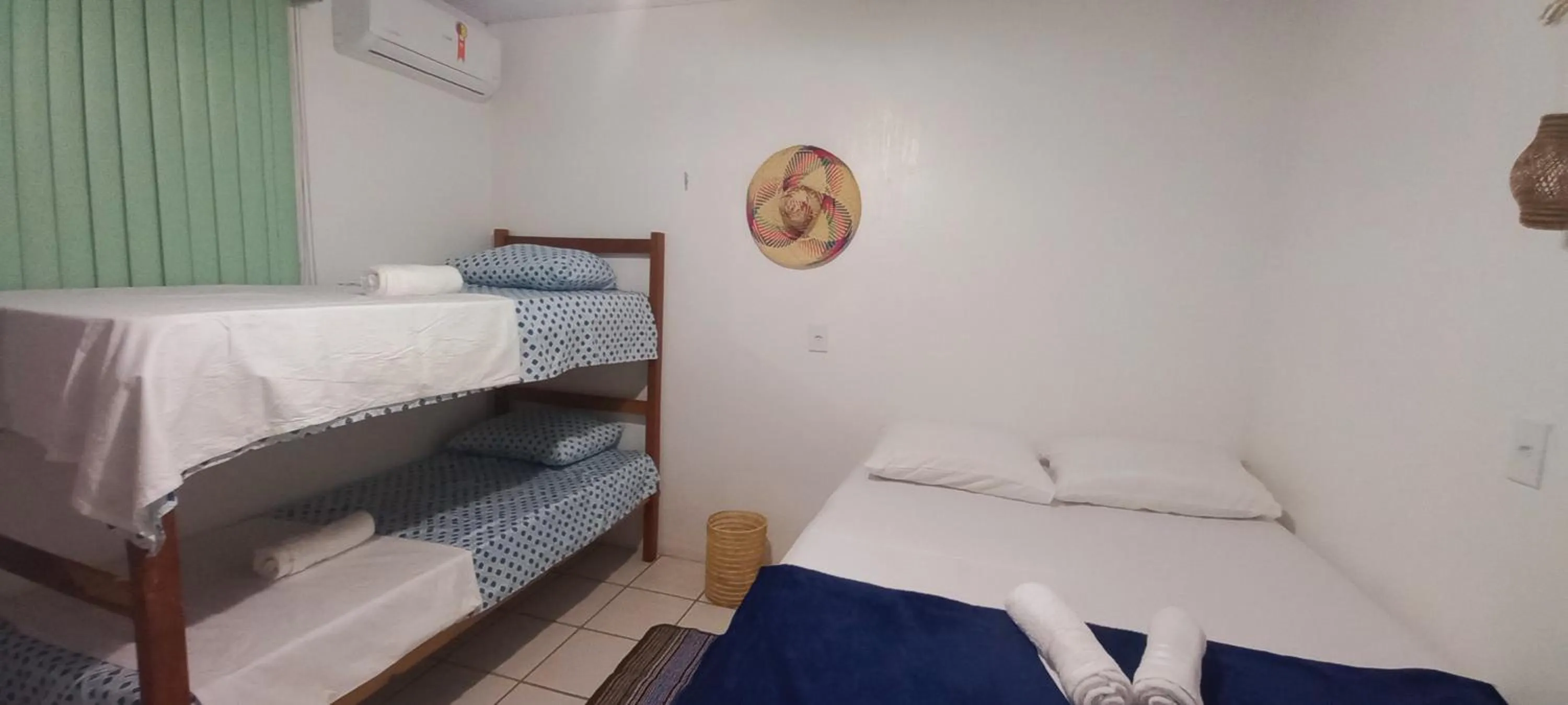 Bed in Pousada Angatu alter