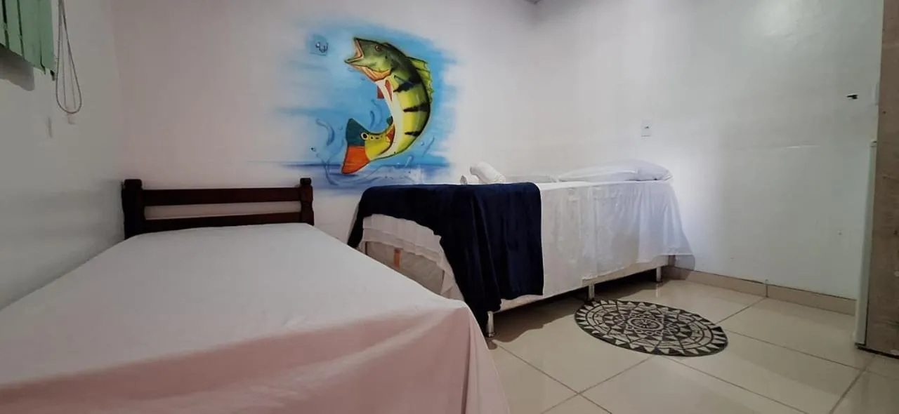 Bed in Pousada Angatu alter