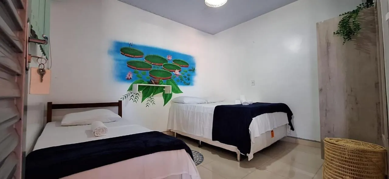 Bed in Pousada Angatu alter