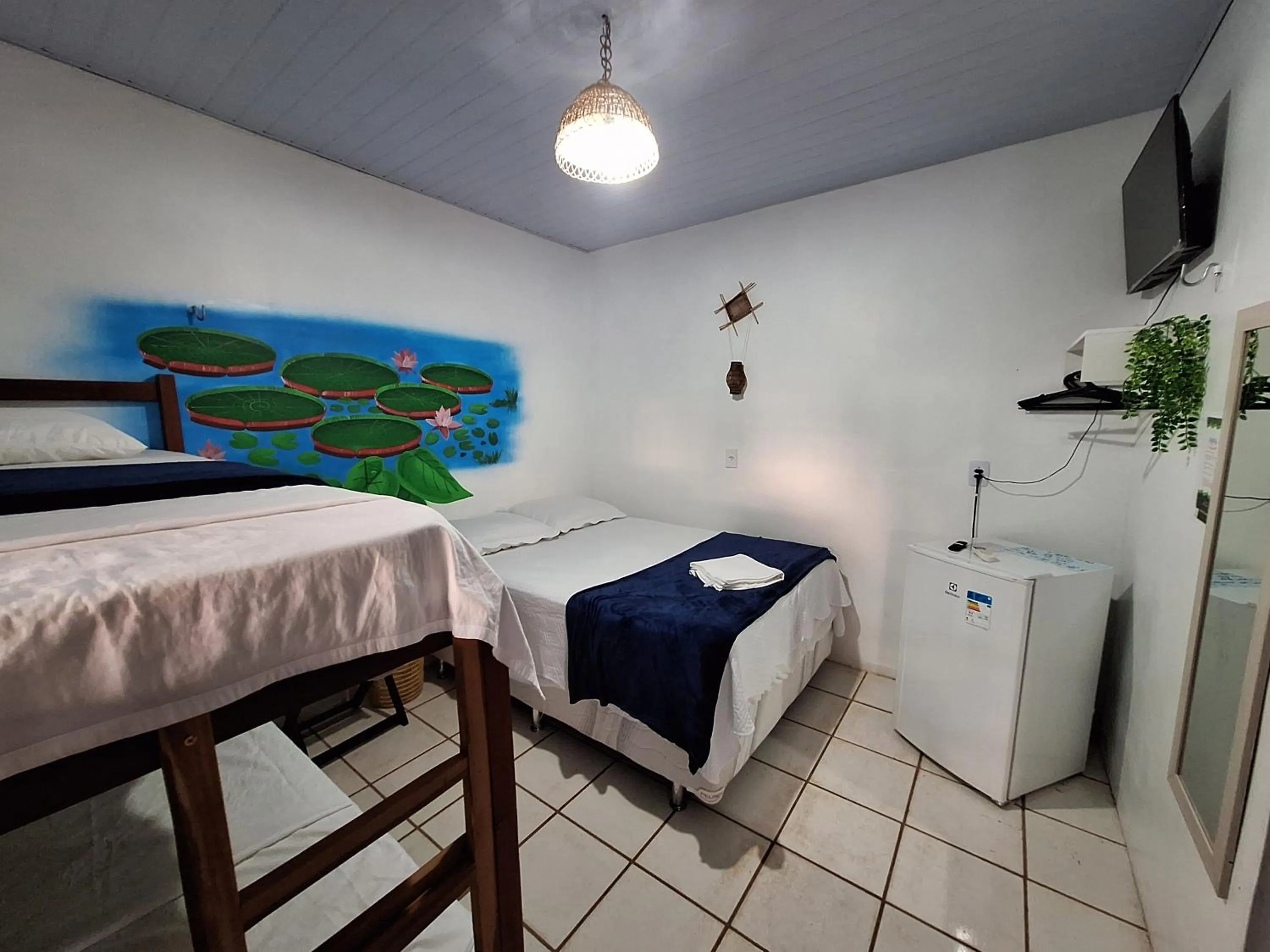 Bed in Pousada Angatu alter