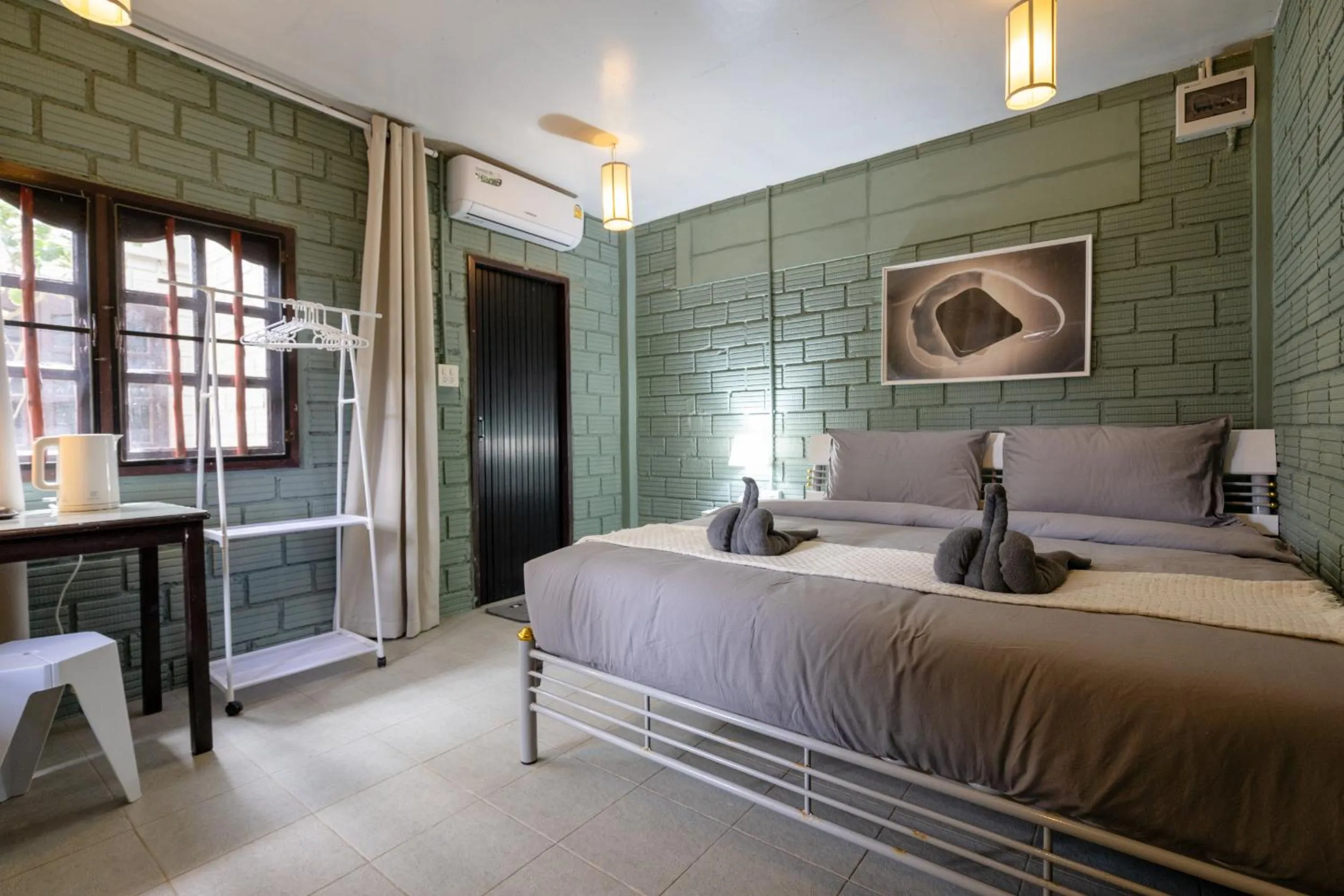 Bed in Breeze Bungalows