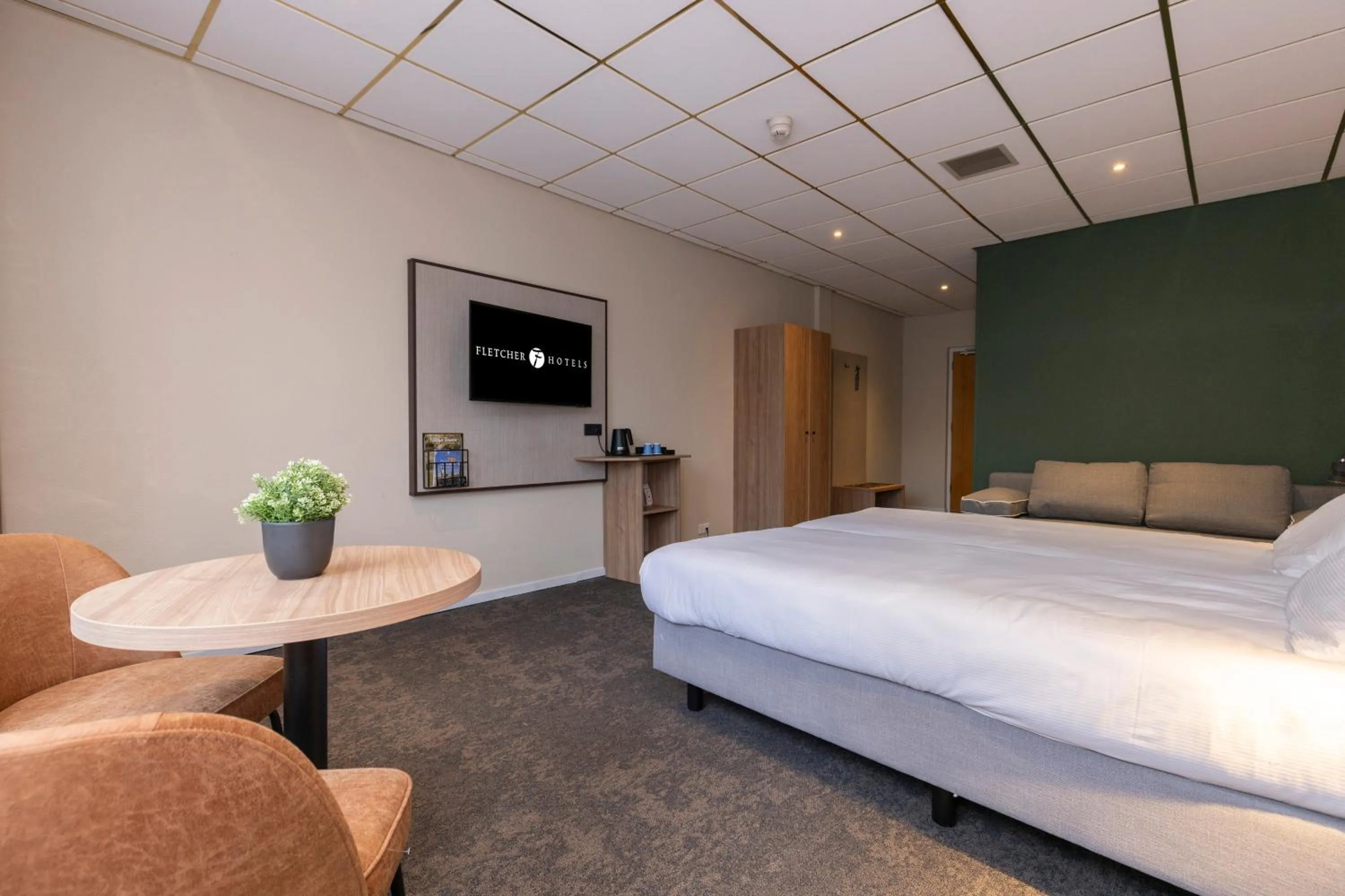 Bed in Fletcher Hotel-Restaurant Langewold