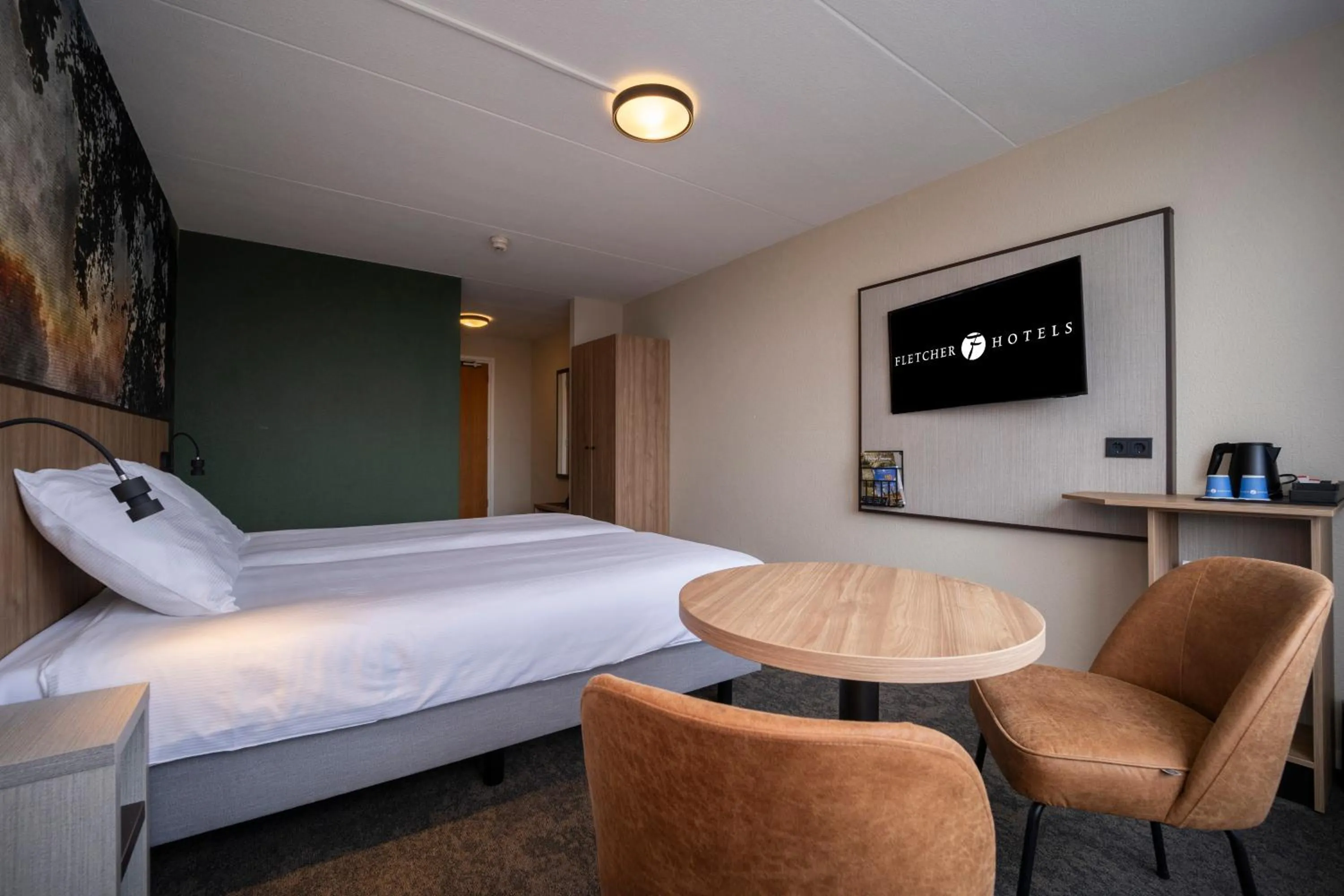 Bed in Fletcher Hotel-Restaurant Langewold