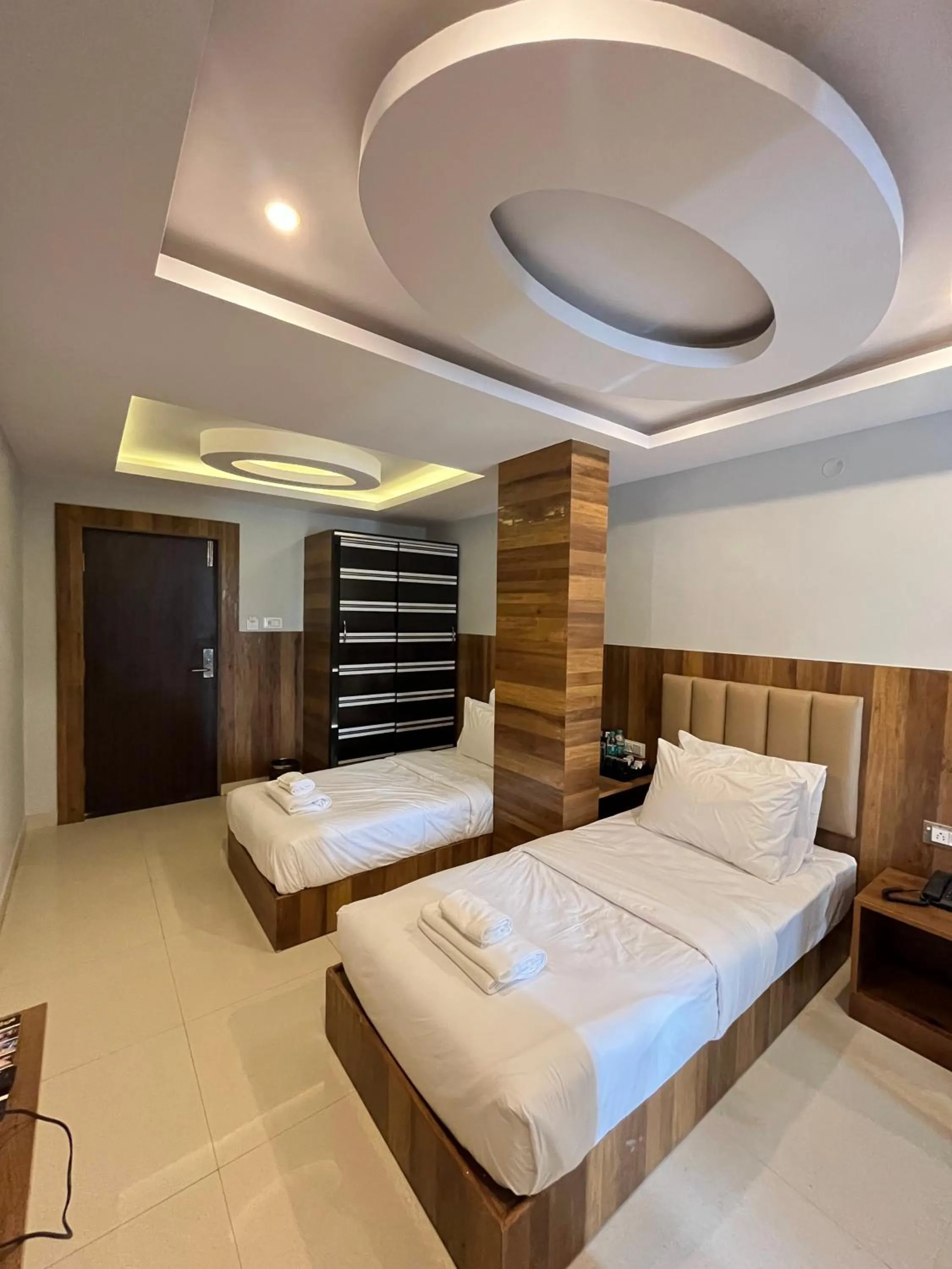 Bed in Hotel Avenue Suites Near International Airport Bangalore
