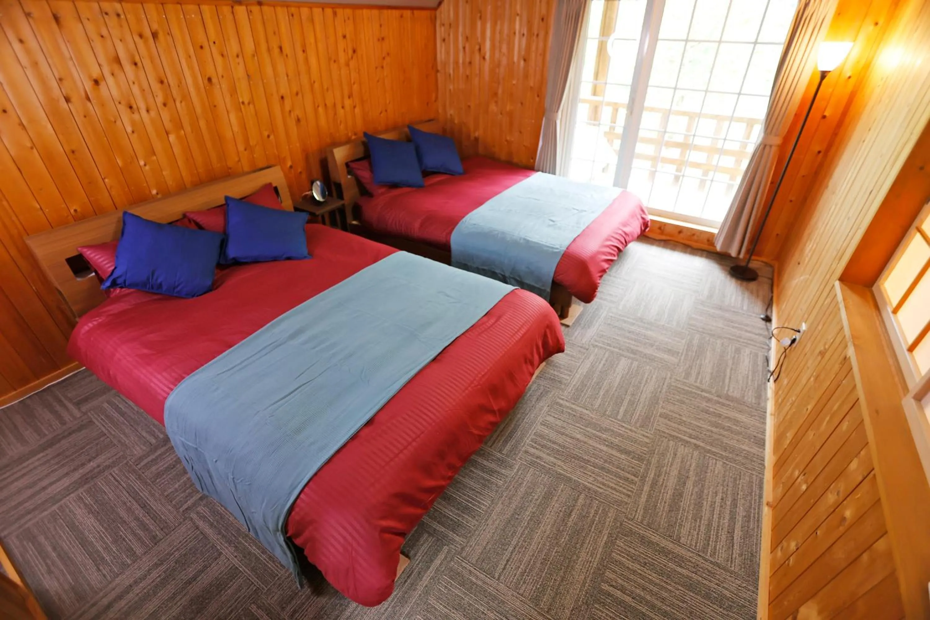 Bed in The LODGE ABASHIRI