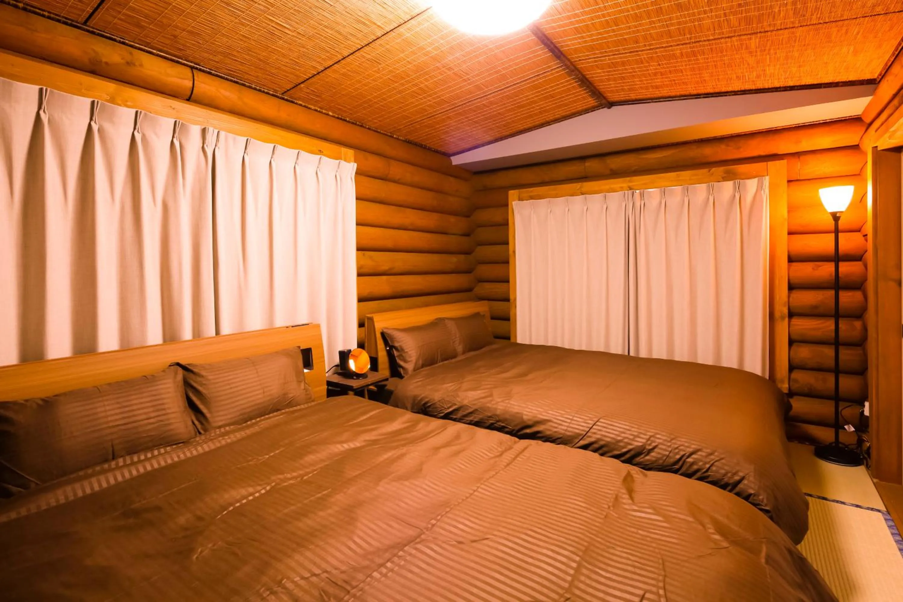 Bed in The LODGE ABASHIRI
