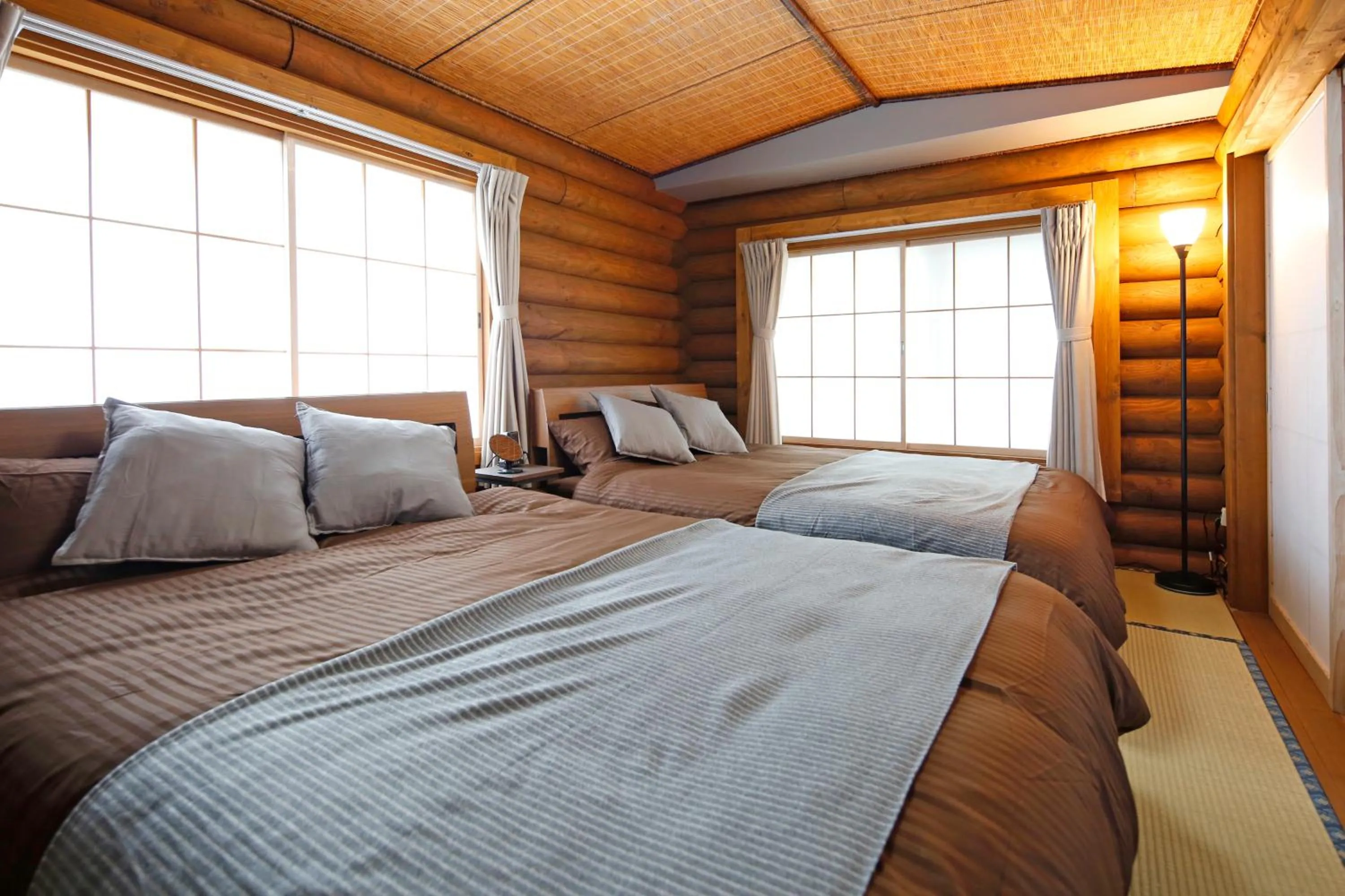 Bed in The LODGE ABASHIRI