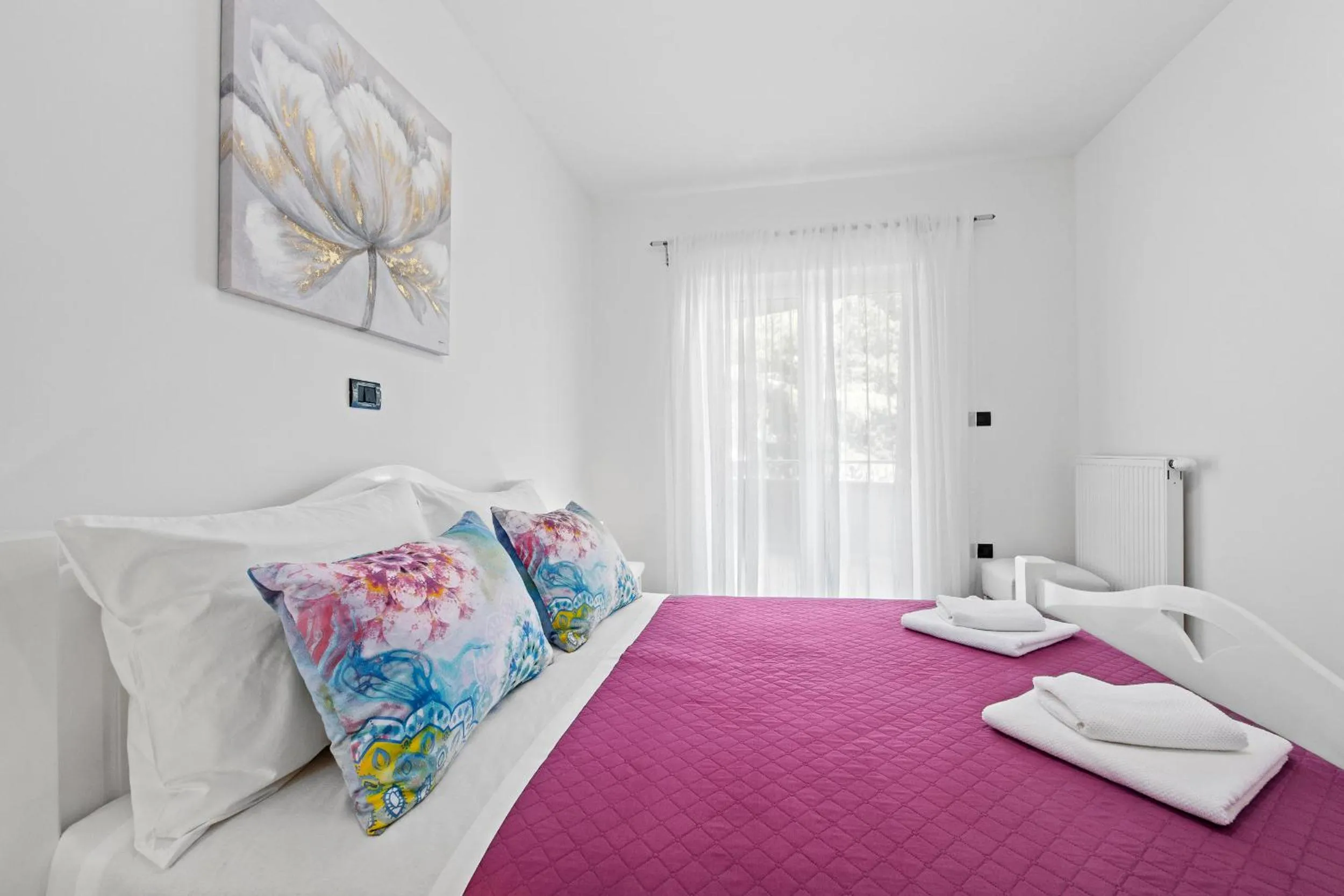 Bed in Feniks Fažana apartman