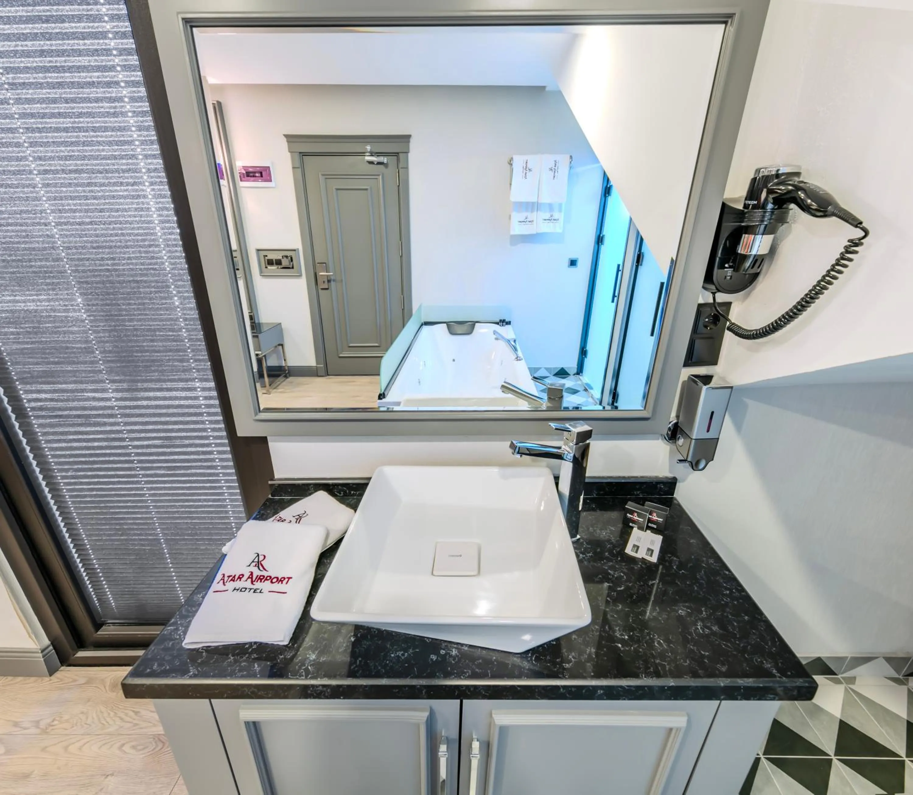 Bathroom in Atar Airport Hotel - Spa & Wellness