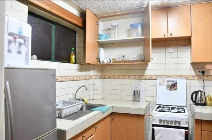 Kitchen or kitchenette in Lux Suites Tropical Towers Apartments Kilimani