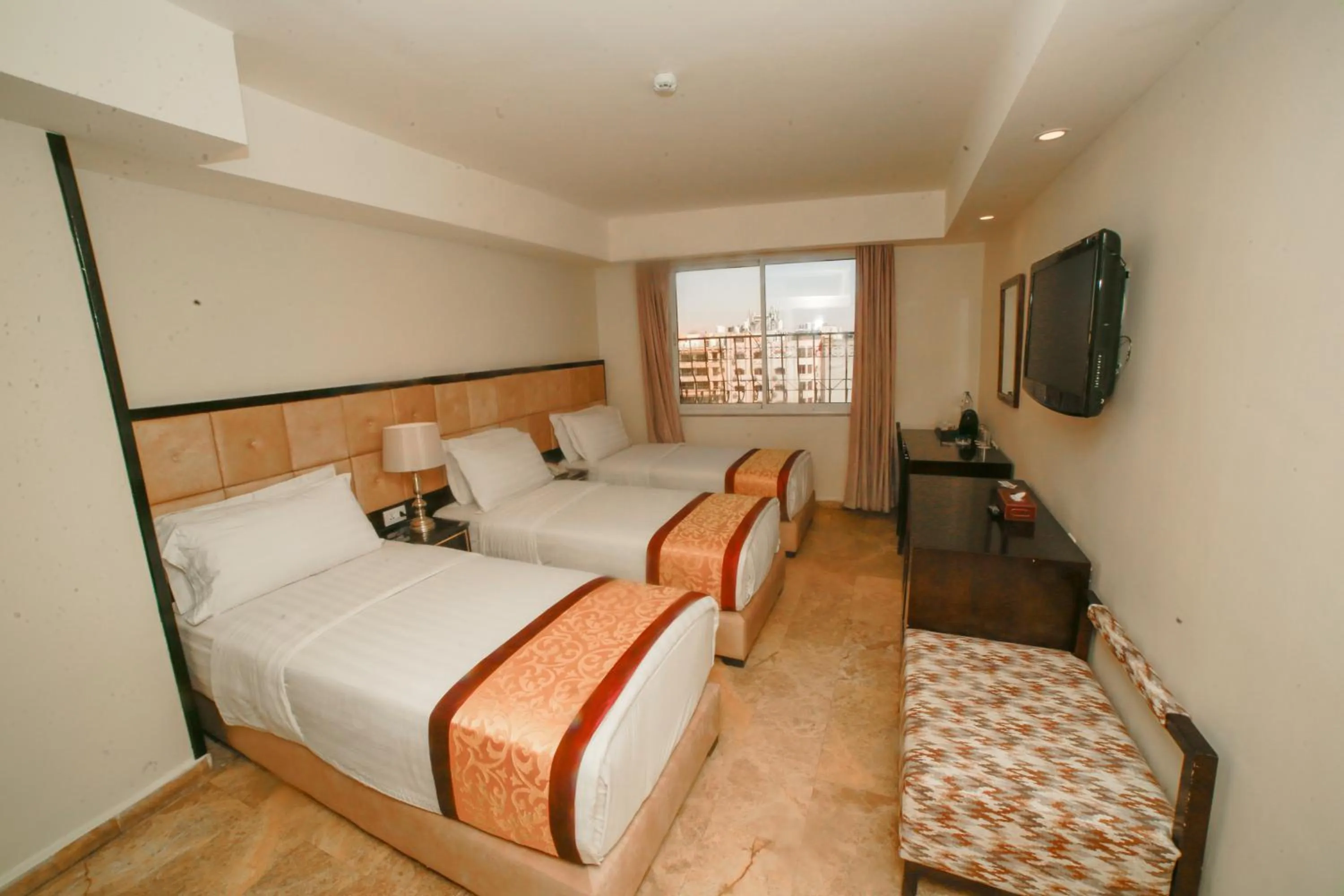 Communal lounge/ TV room, Bed in Yafko Hotel