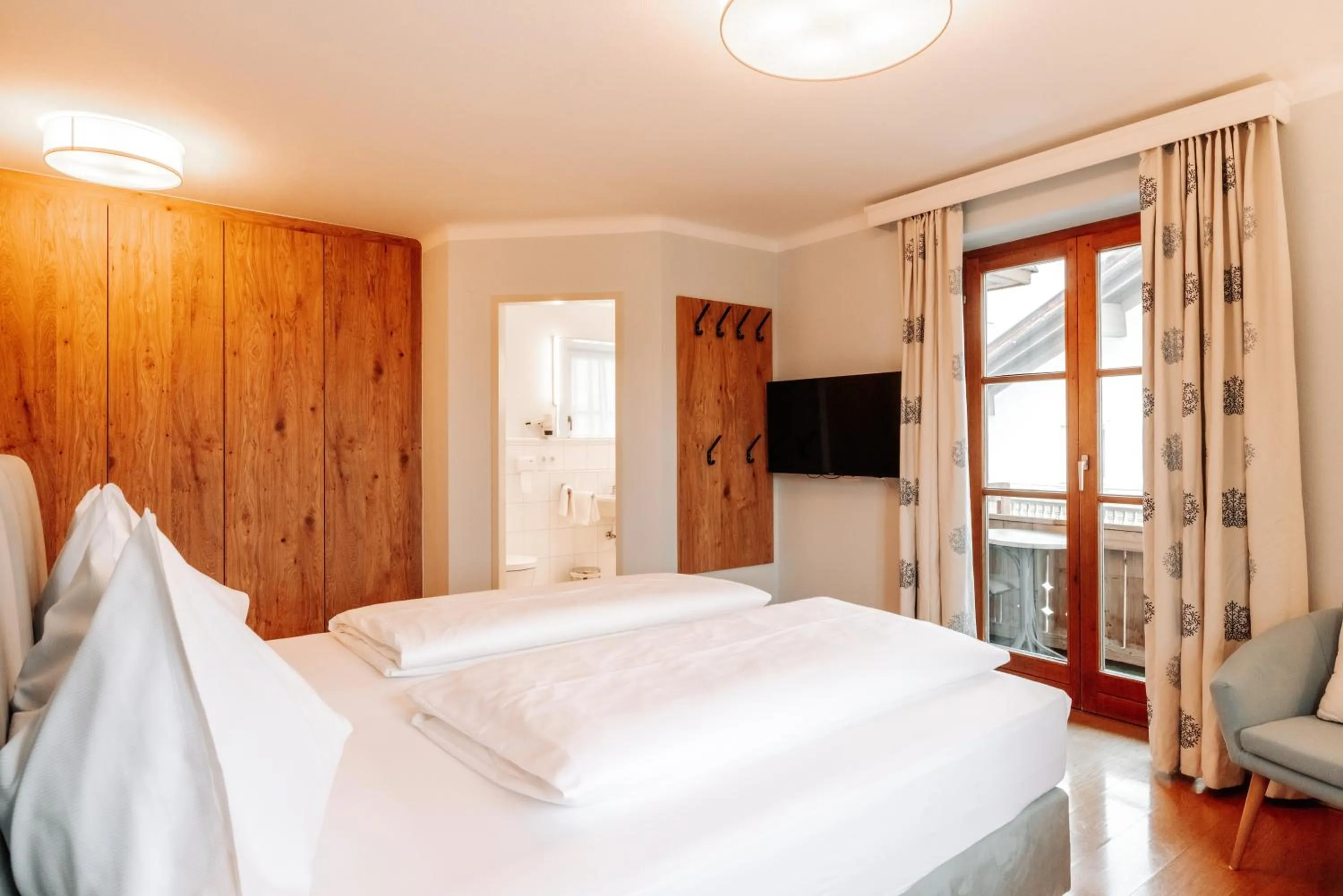 Bed in Hubertus Boutiquehotel Filzmoos