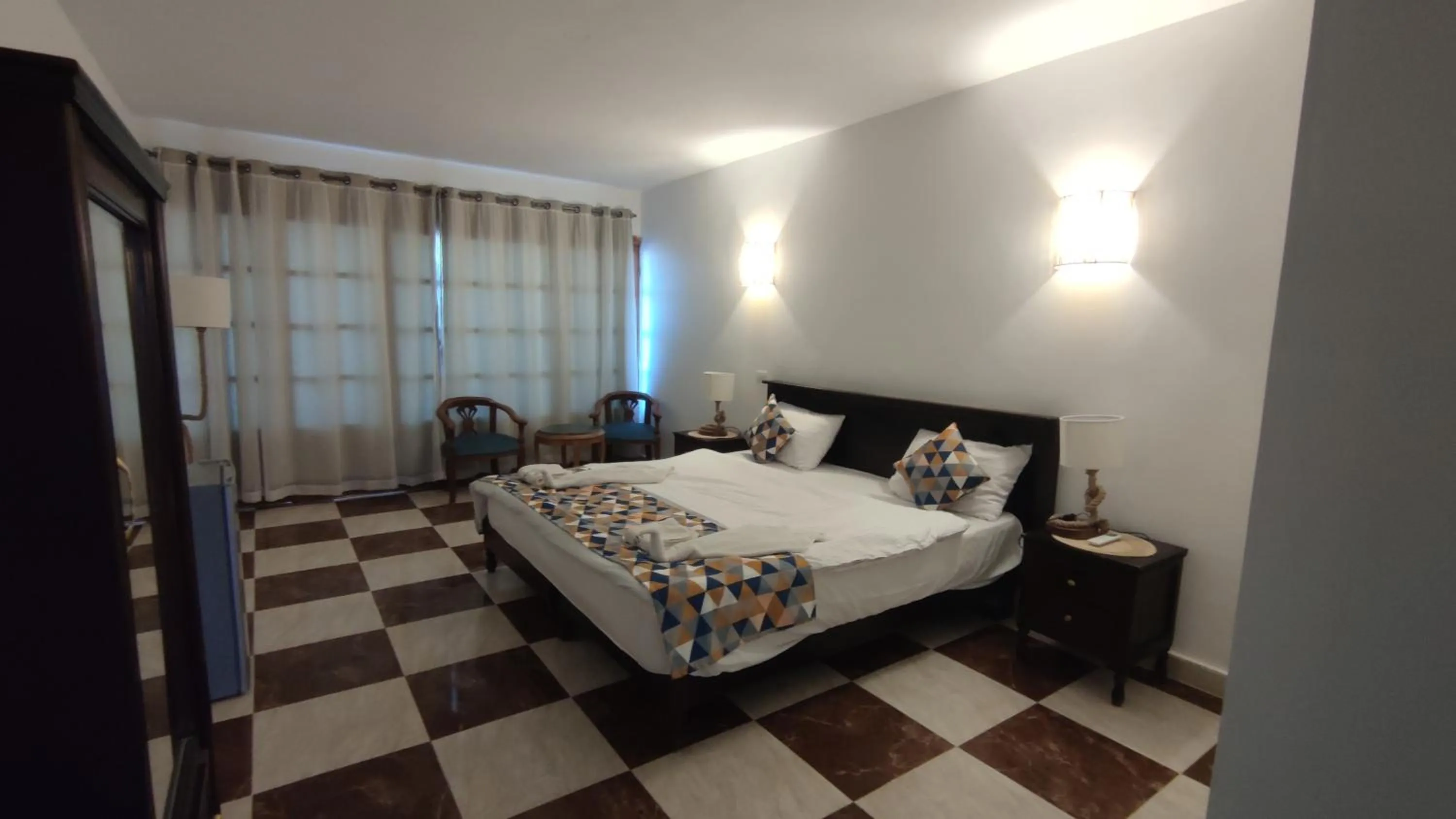 Photo of the whole room, Bed in Serenity Lodge