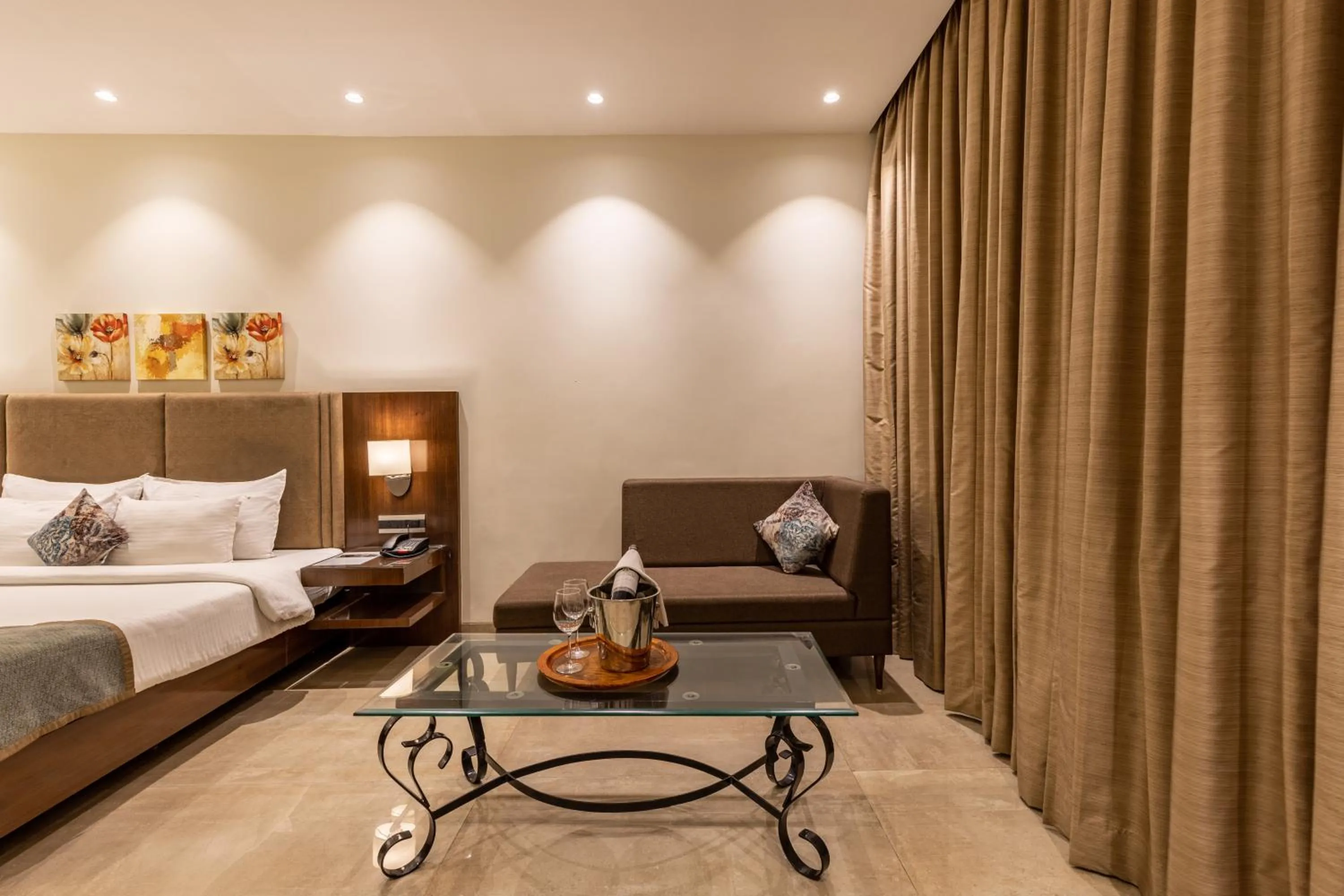 Seating area, Bed in Kwality's Motel Shiraz