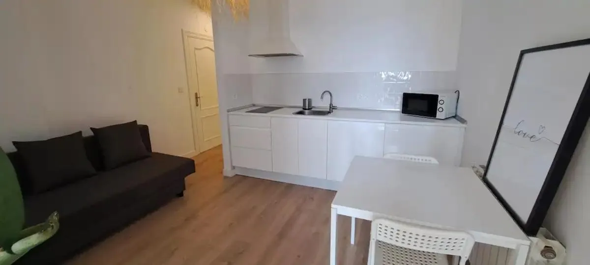 Kitchen or kitchenette in La Arena Apartamentos Zierbena