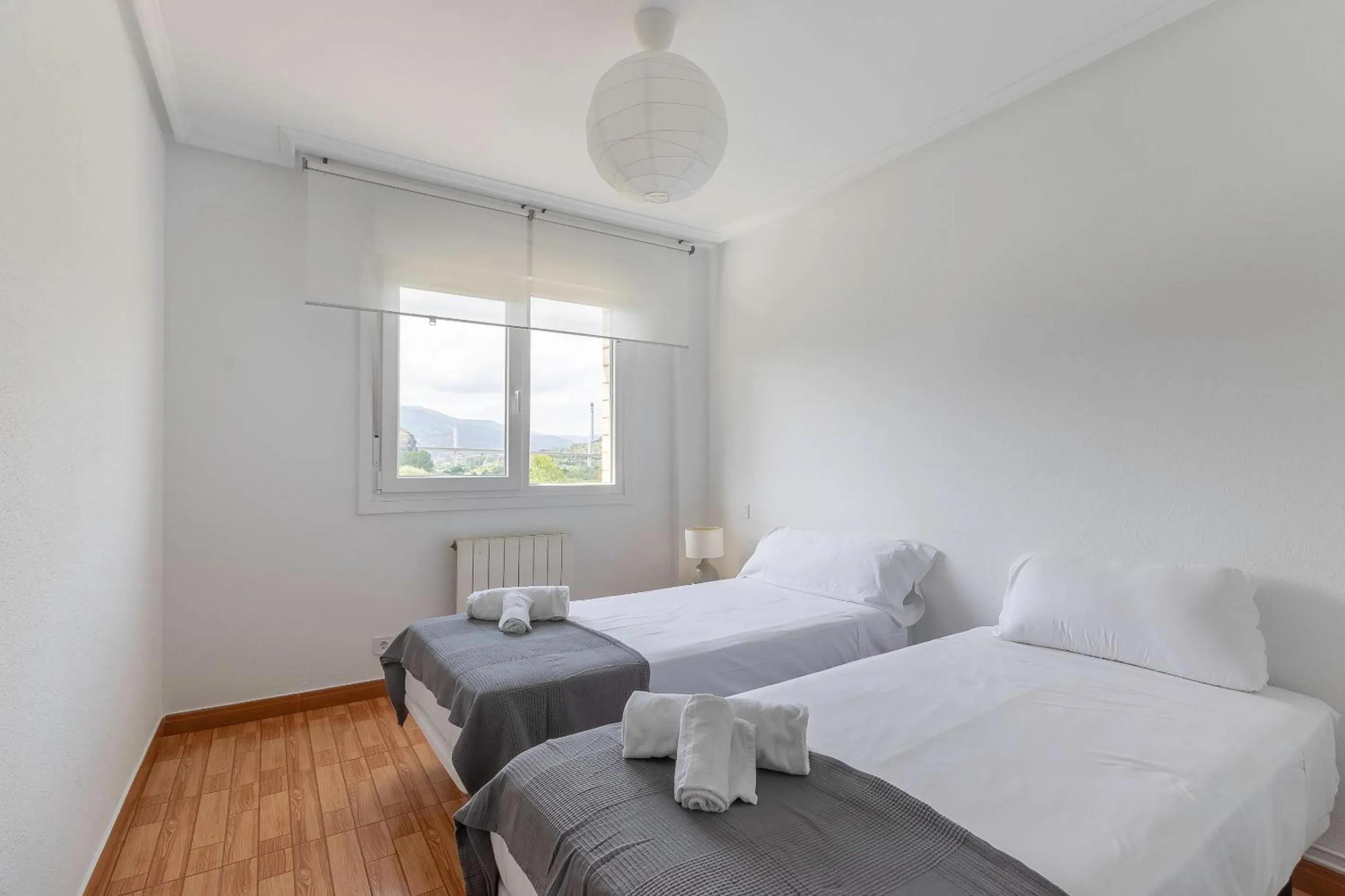 Bed in La Arena Apartamentos Zierbena