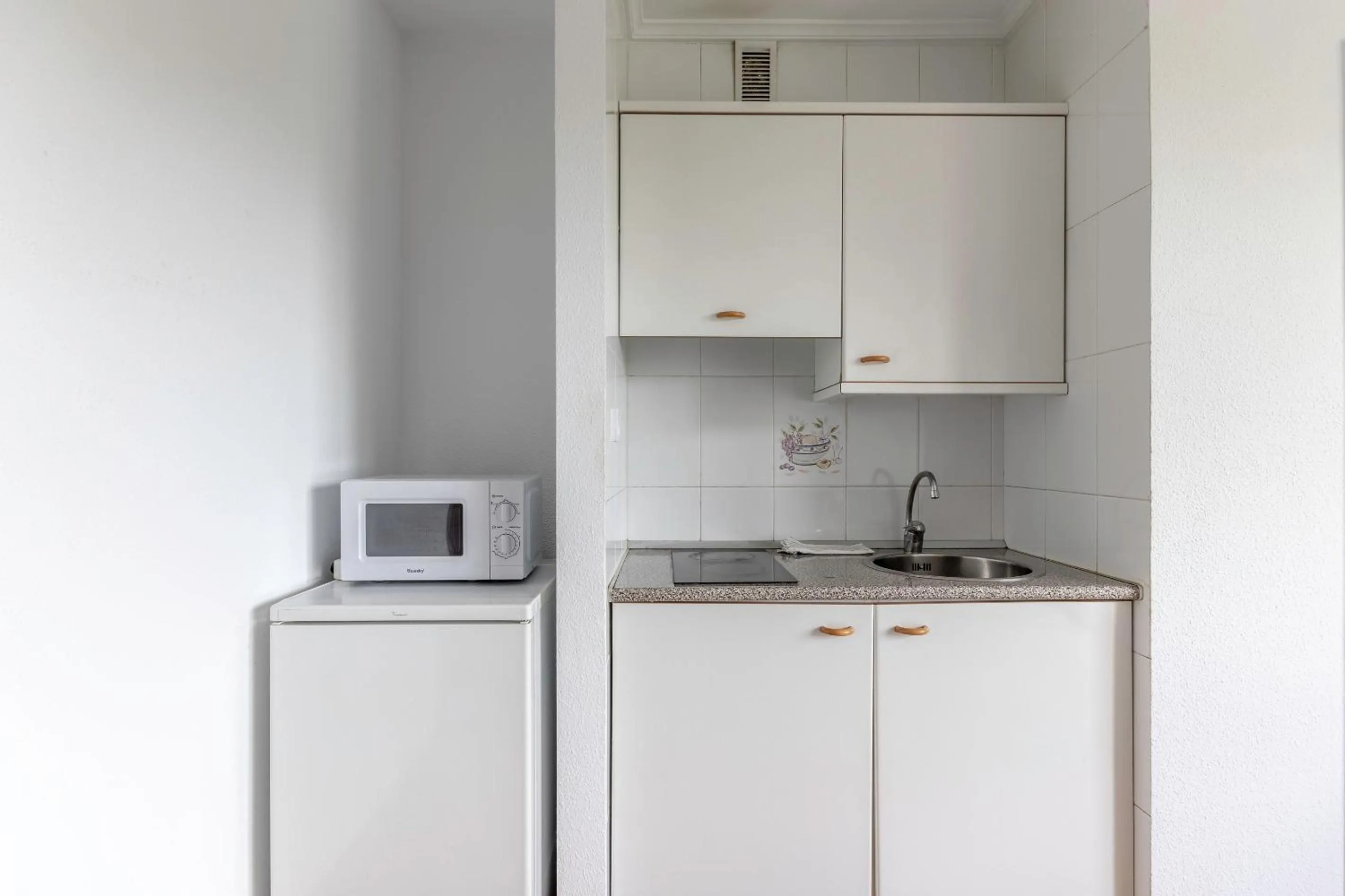 Kitchen or kitchenette in La Arena Apartamentos Zierbena