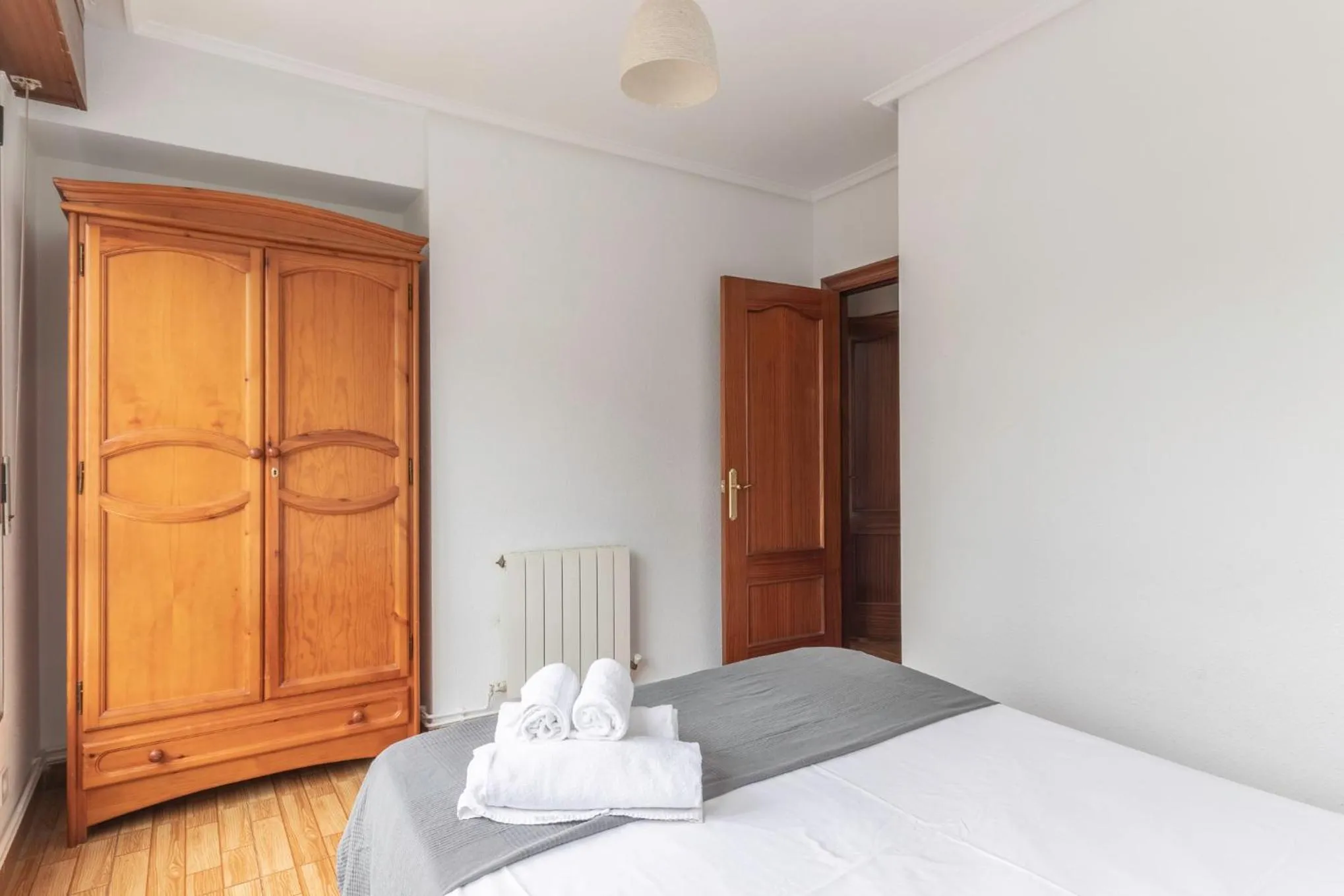 Bed in La Arena Apartamentos Zierbena