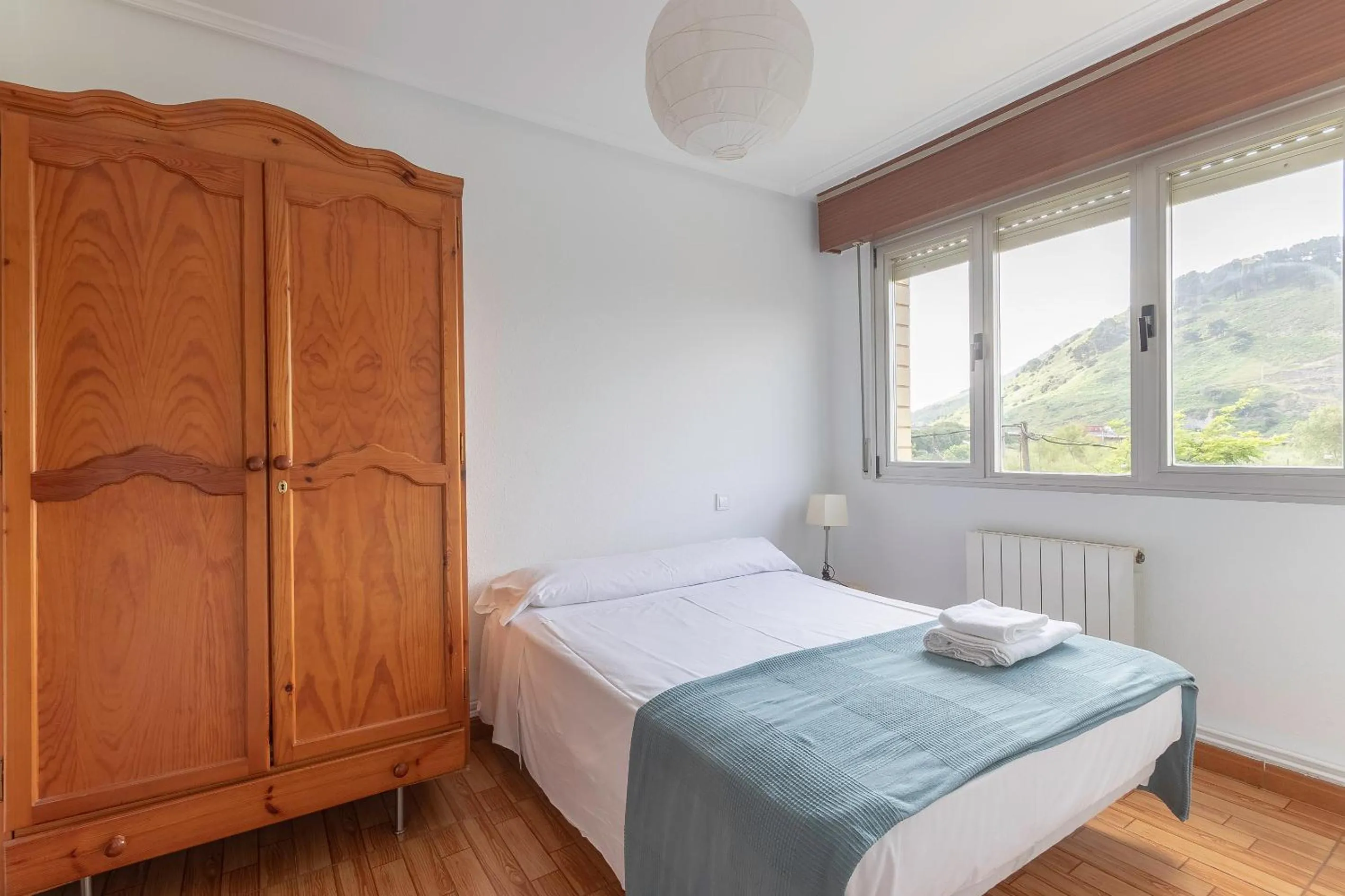 Bed in La Arena Apartamentos Zierbena