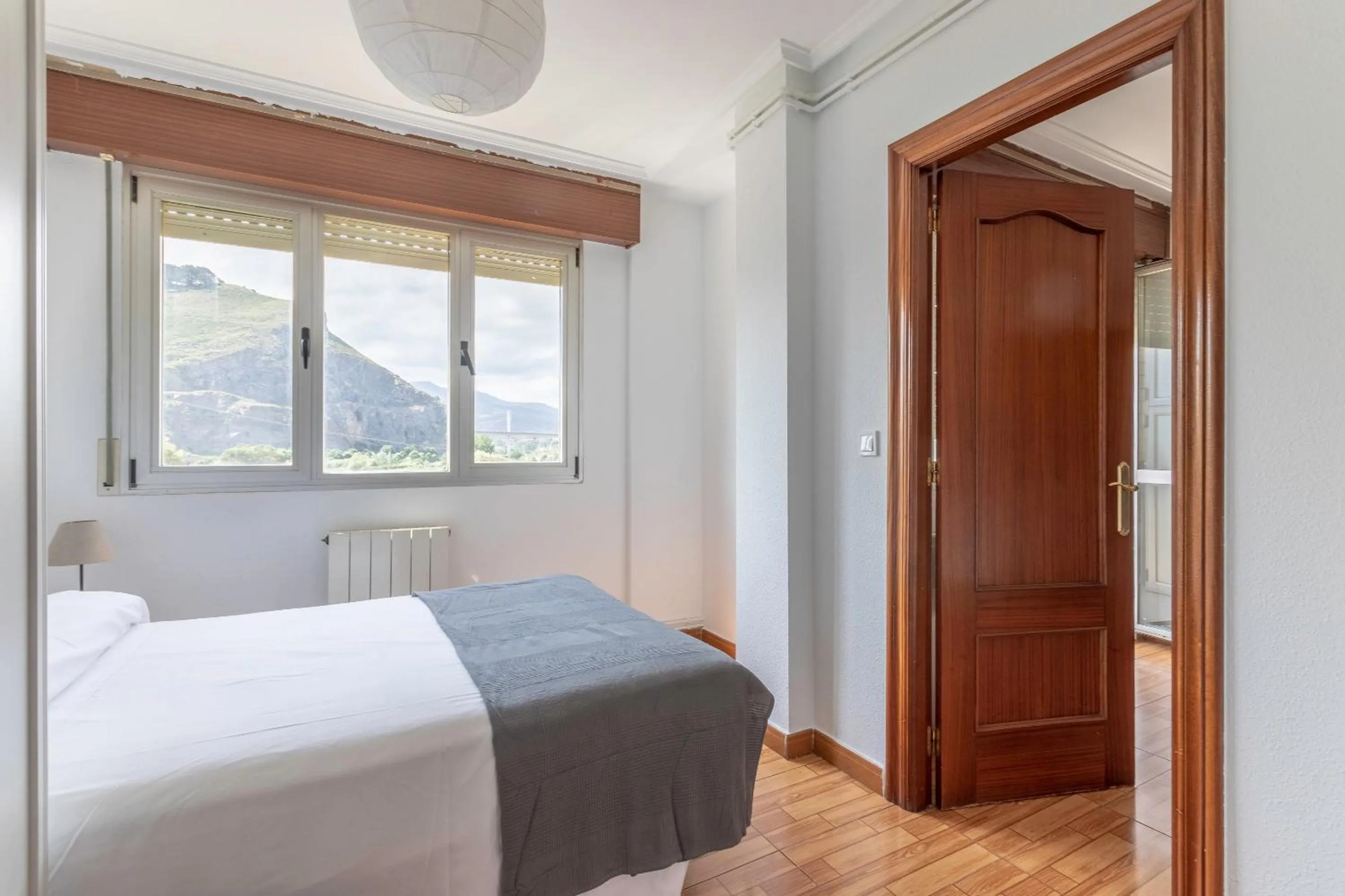 Bed in La Arena Apartamentos Zierbena