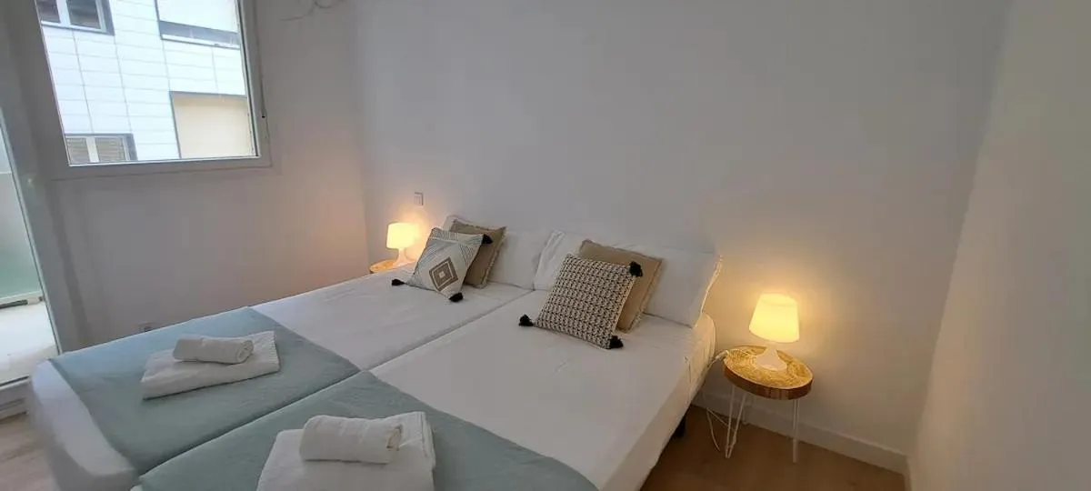 Bed in La Arena Apartamentos Zierbena