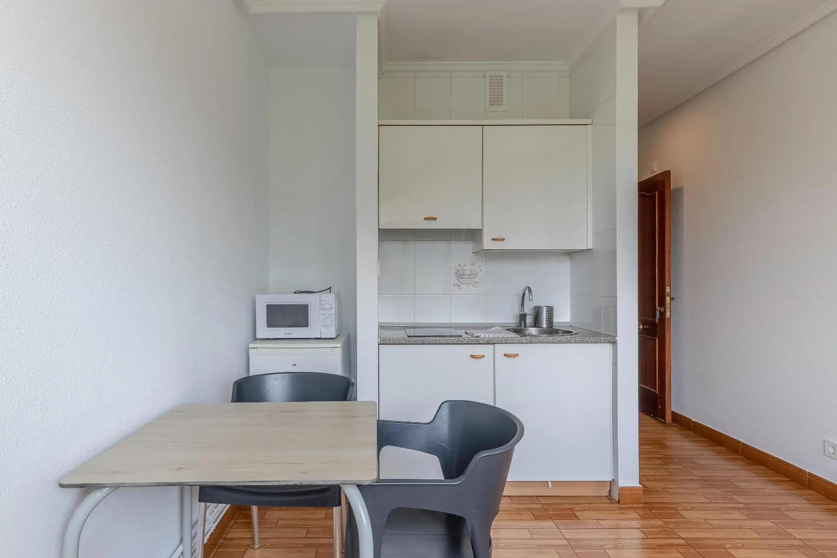 Kitchen or kitchenette in La Arena Apartamentos Zierbena