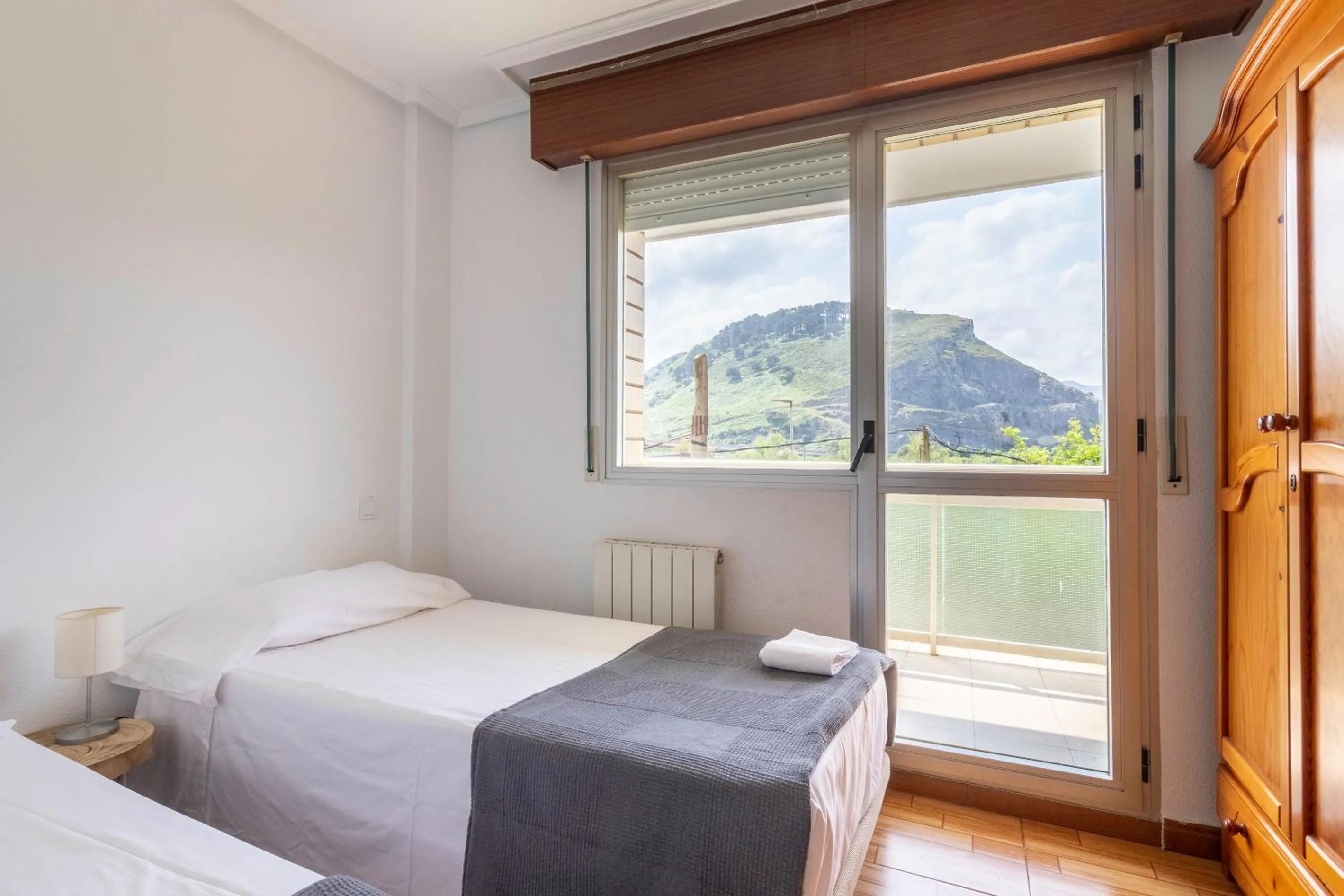 Bed in La Arena Apartamentos Zierbena