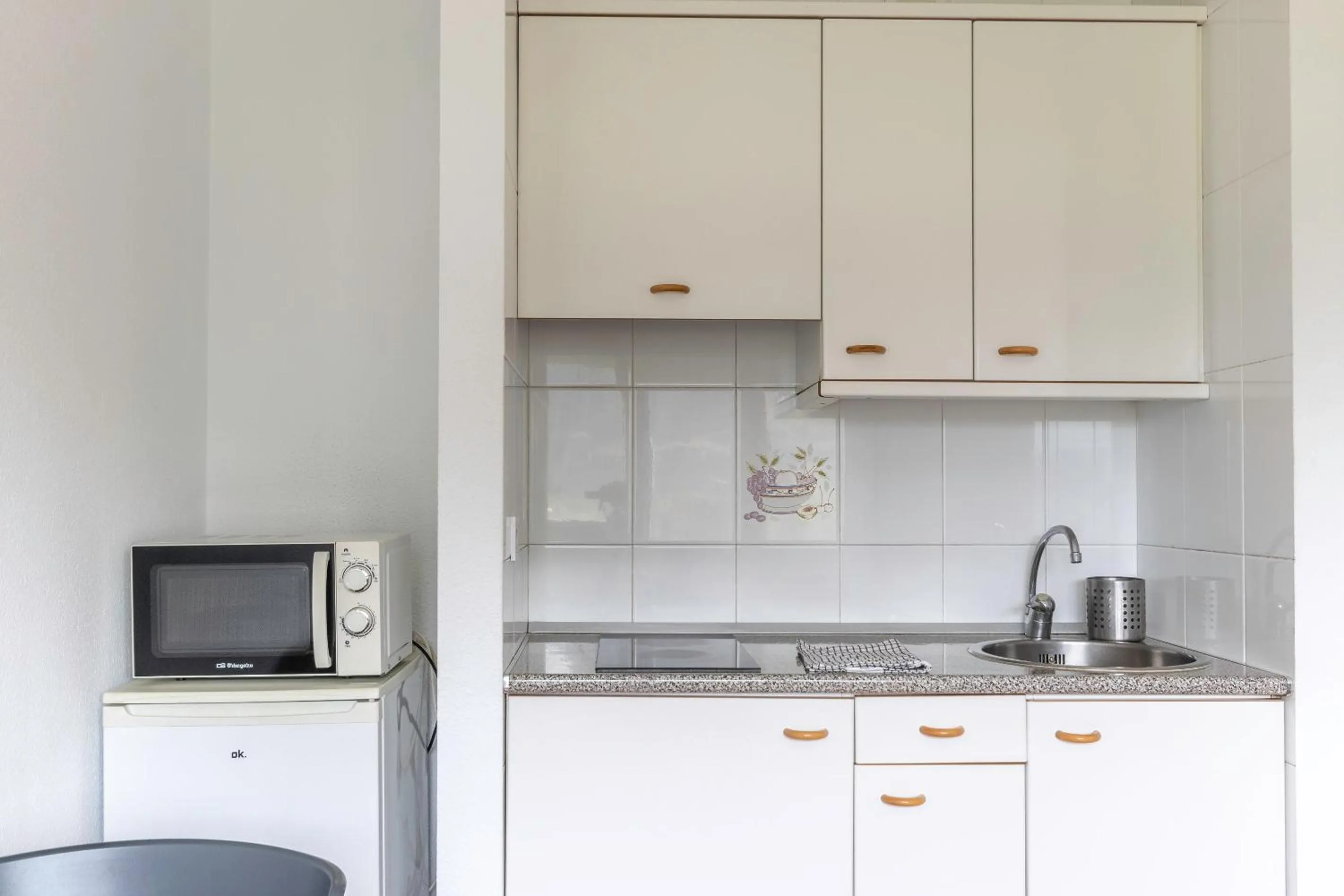 Kitchen or kitchenette in La Arena Apartamentos Zierbena