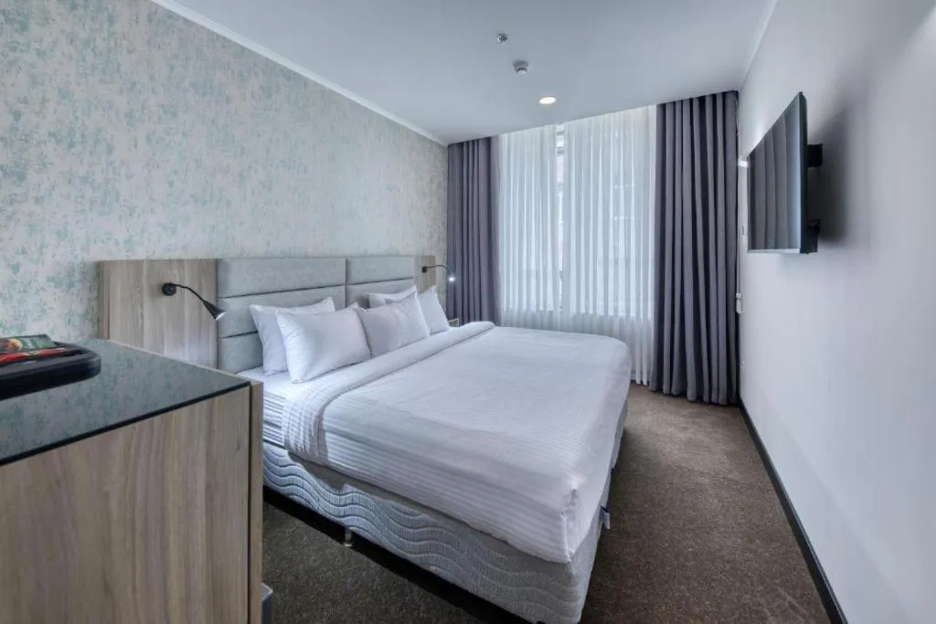 Bed in Expocore Hotel