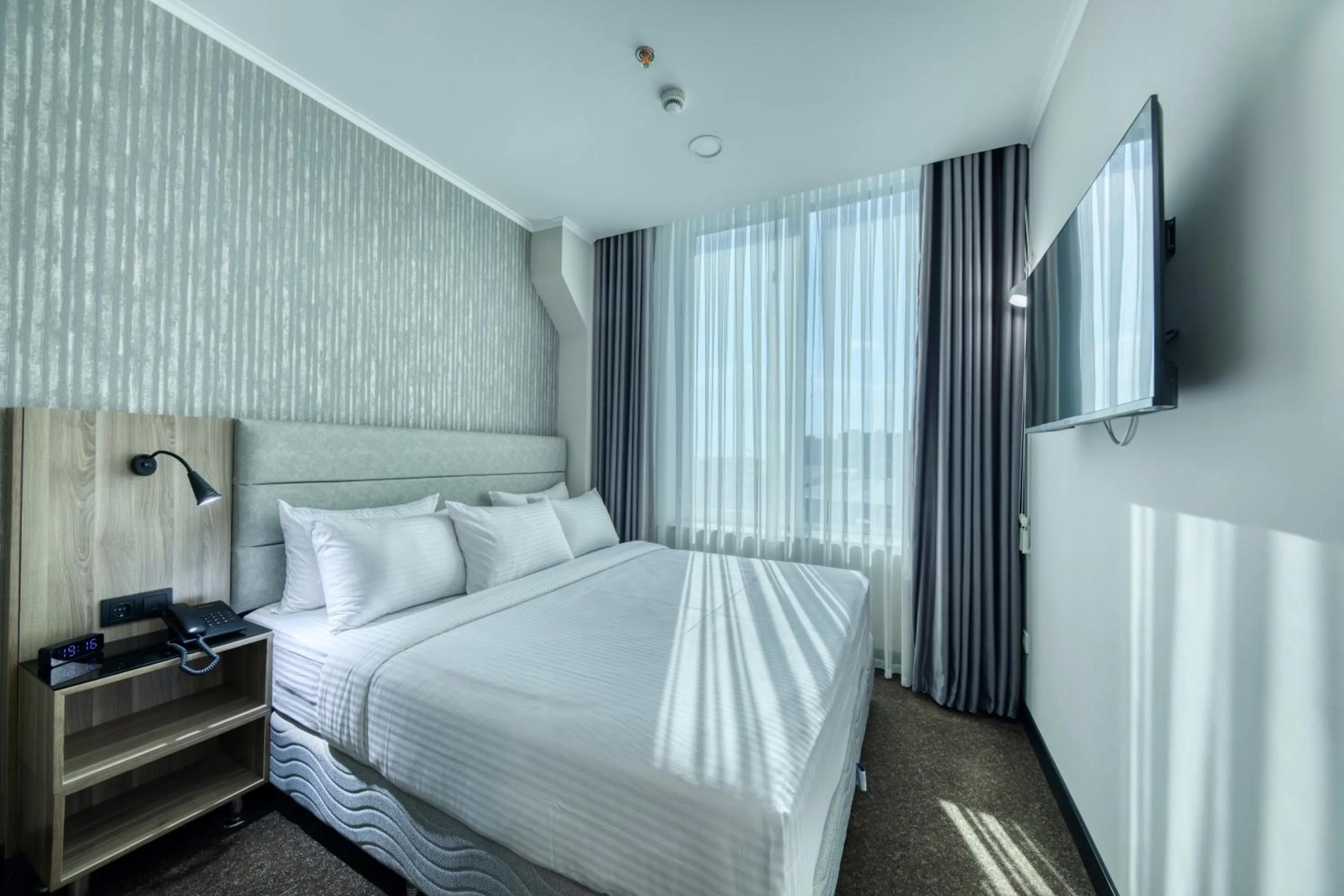 Bed in Expocore Hotel