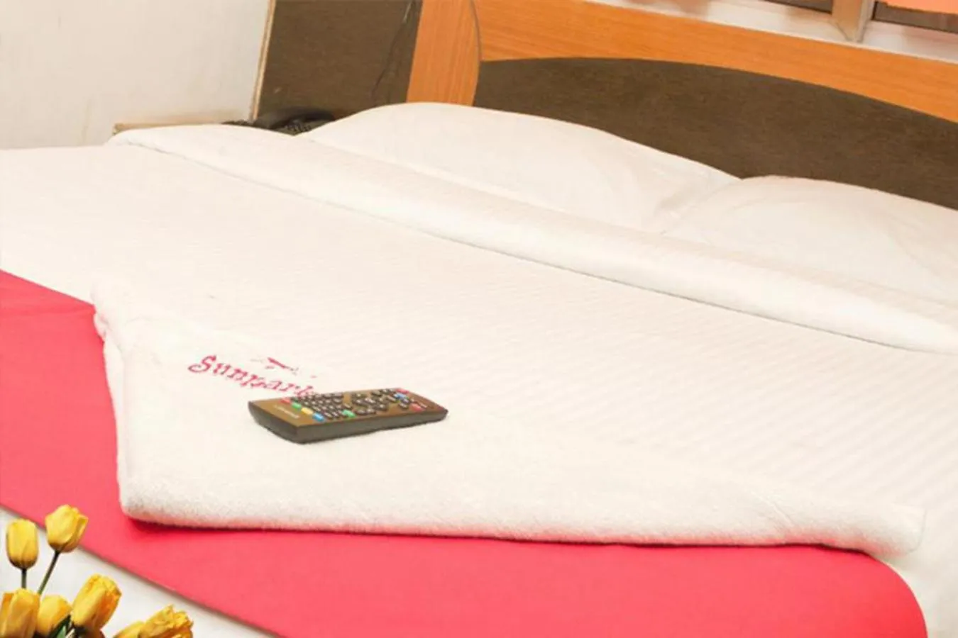 Bed in Hotel Sunpark Inn