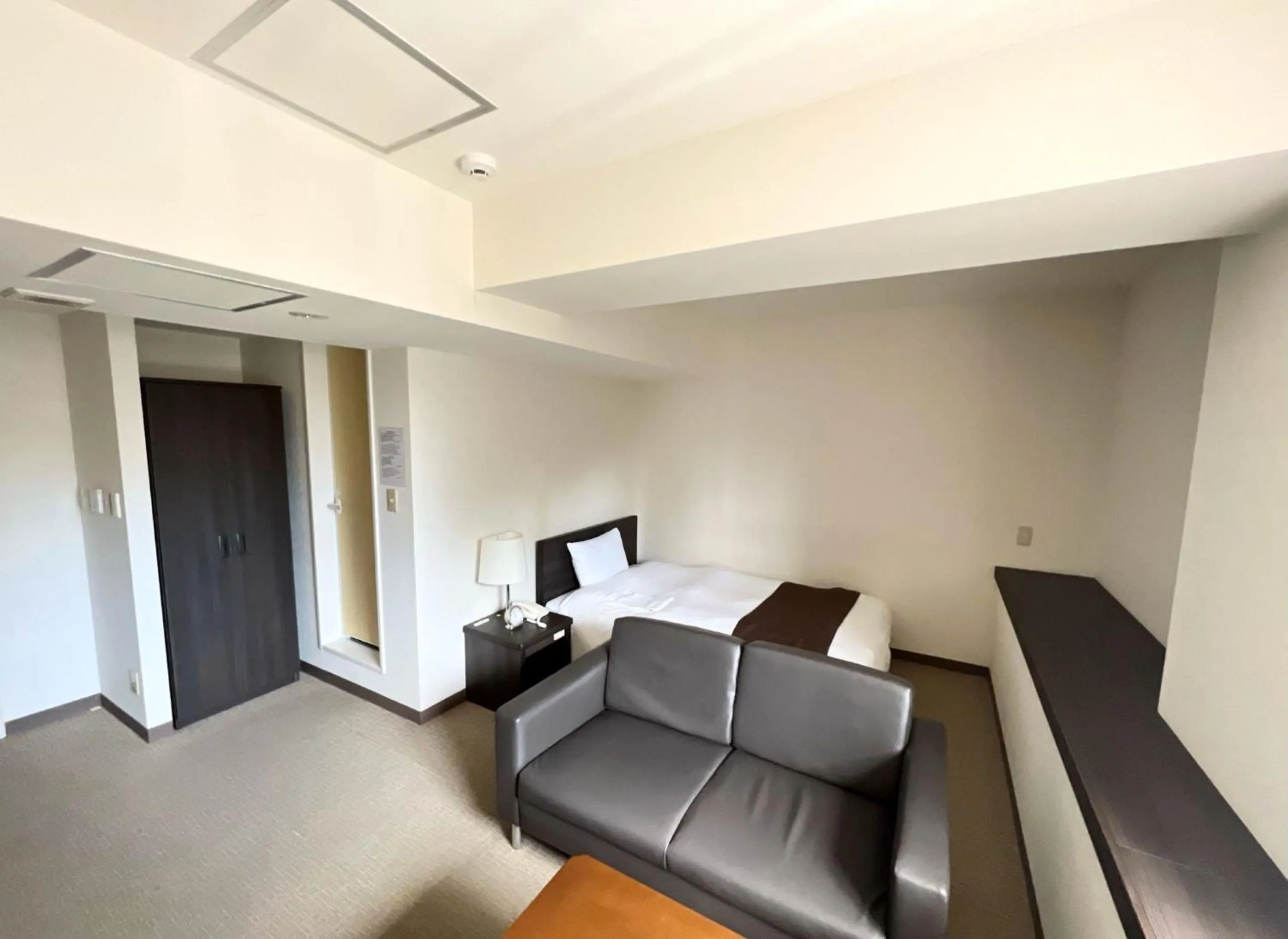 Bed in Shinjuku Sun Park Hotel