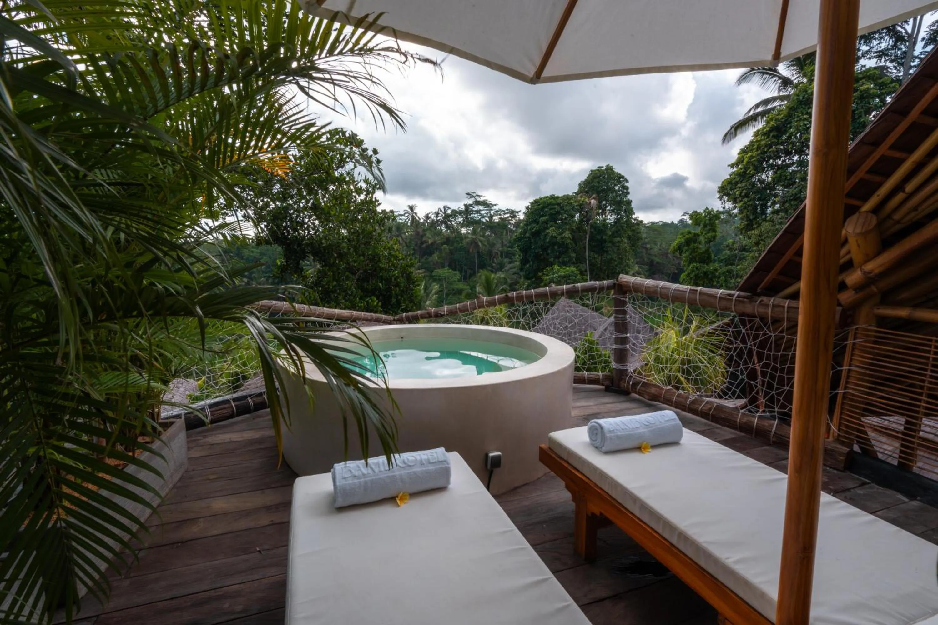 Hot Tub in Bambootel Sawah View