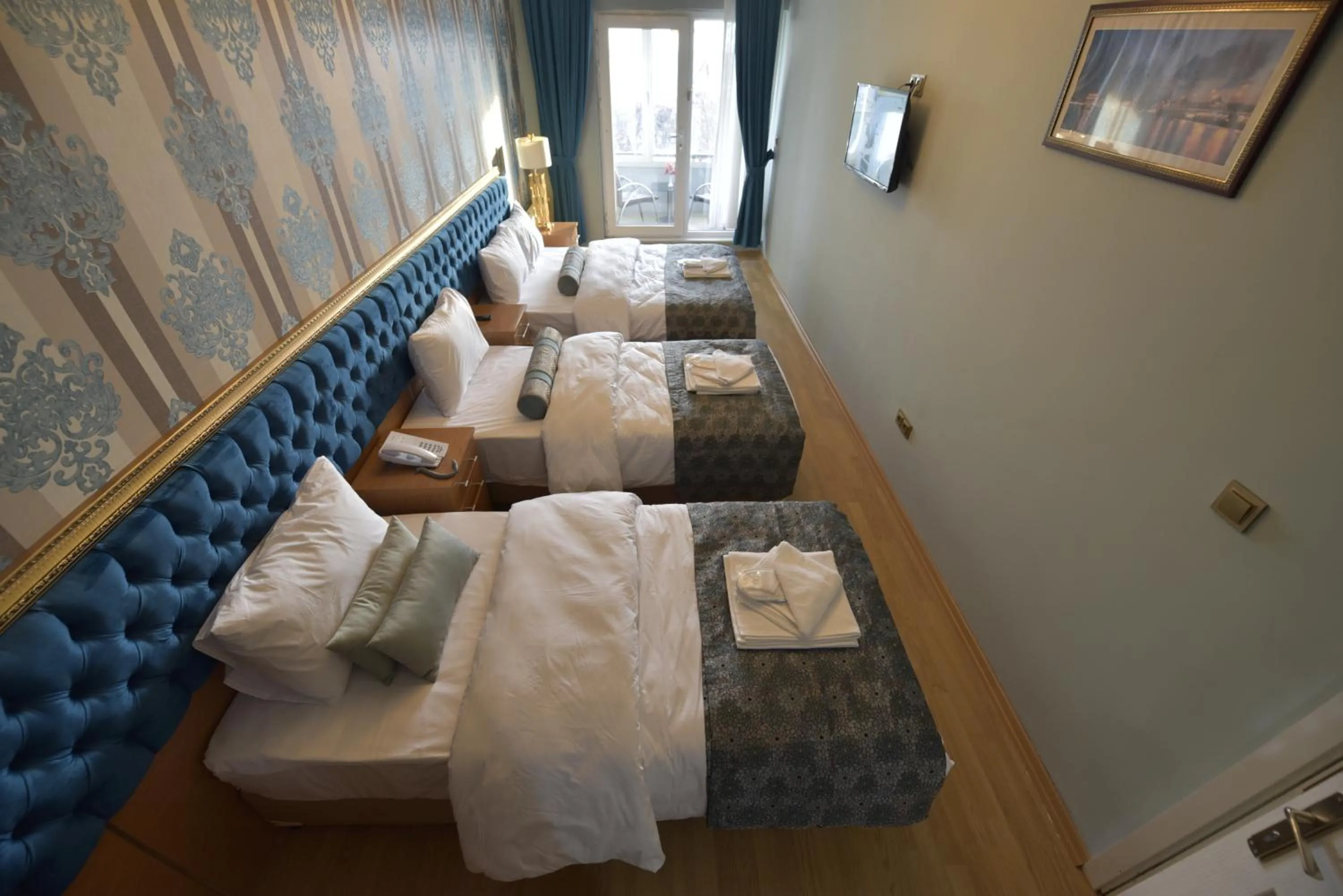 Bed in GOLDEN PALACE SEA ViEW