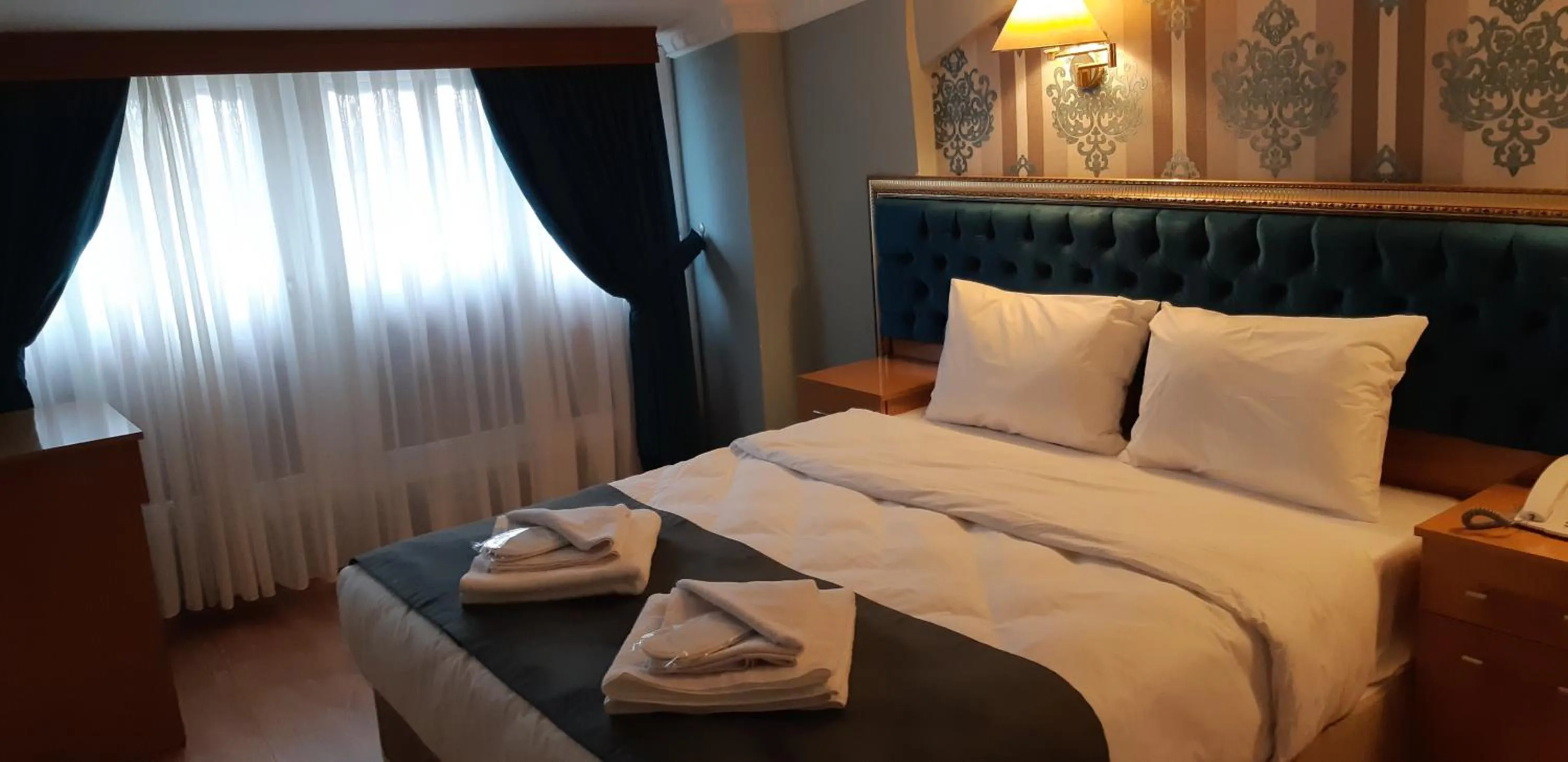 Photo of the whole room, Bed in GOLDEN PALACE SEA ViEW