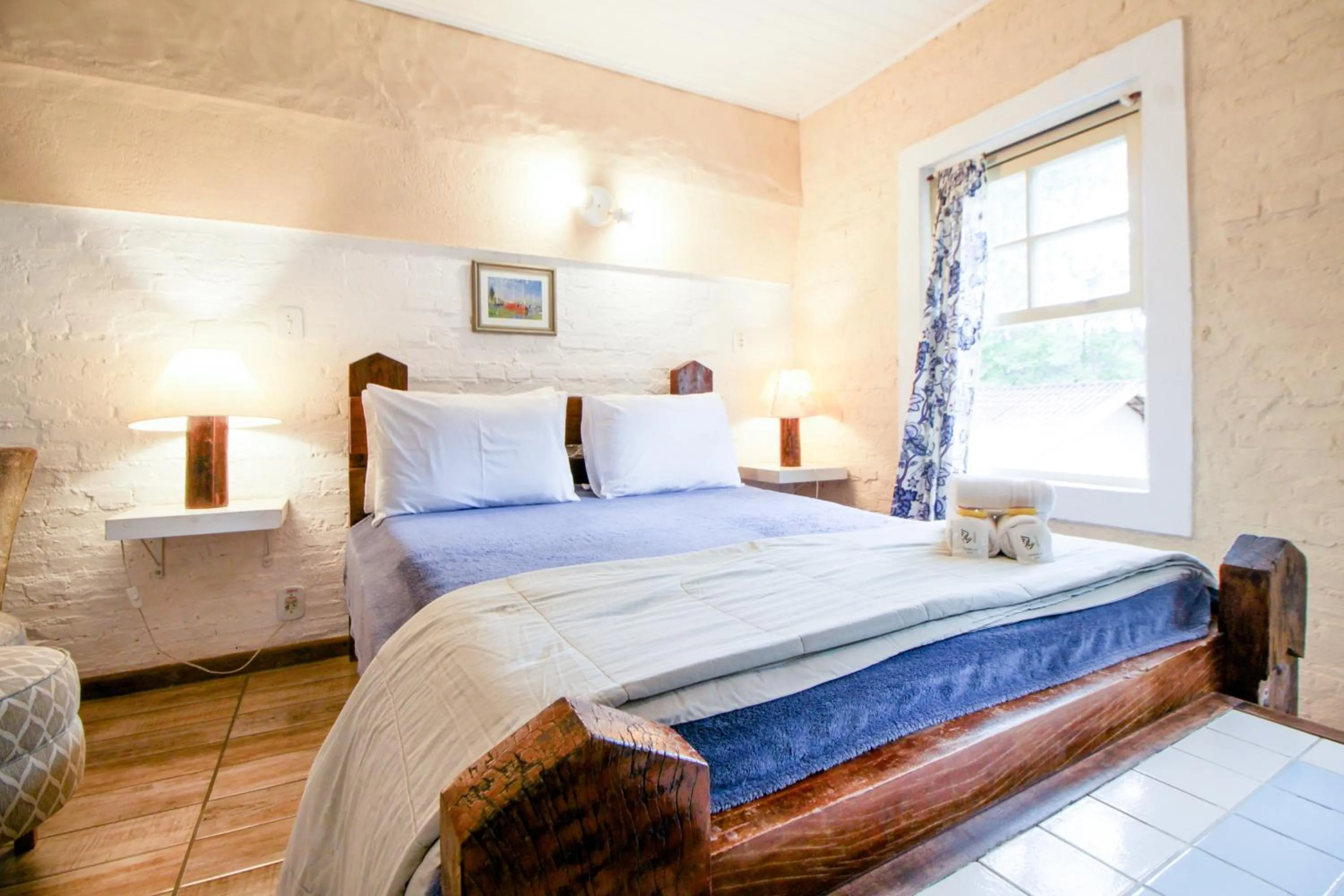 Bed in VELINN Pousada Cesar