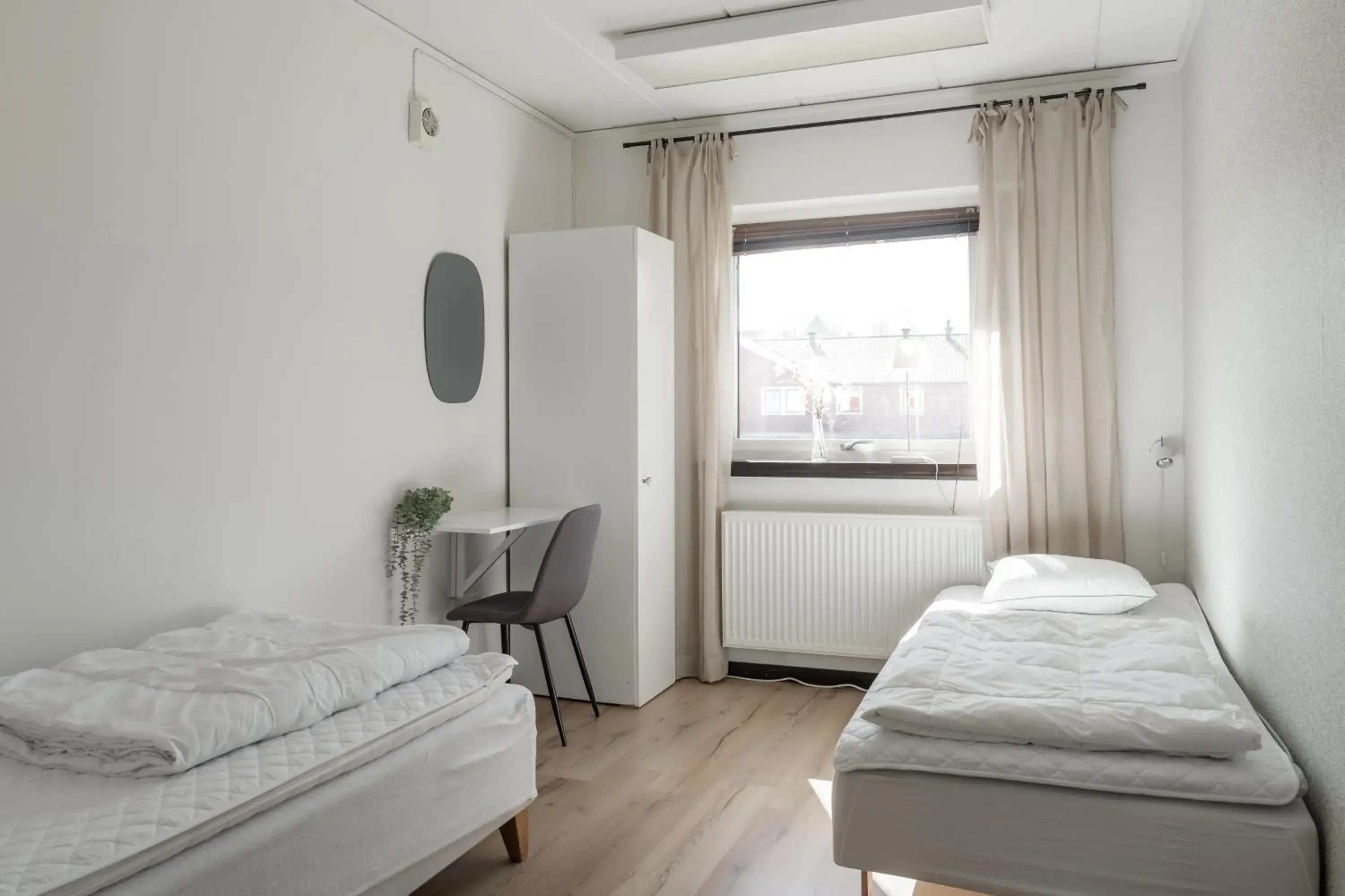 Twin Room with Shared Bathroom in Saxvikens vandrarhem Twin Room with Shared Bathroom in Saxvikens vandrarhem