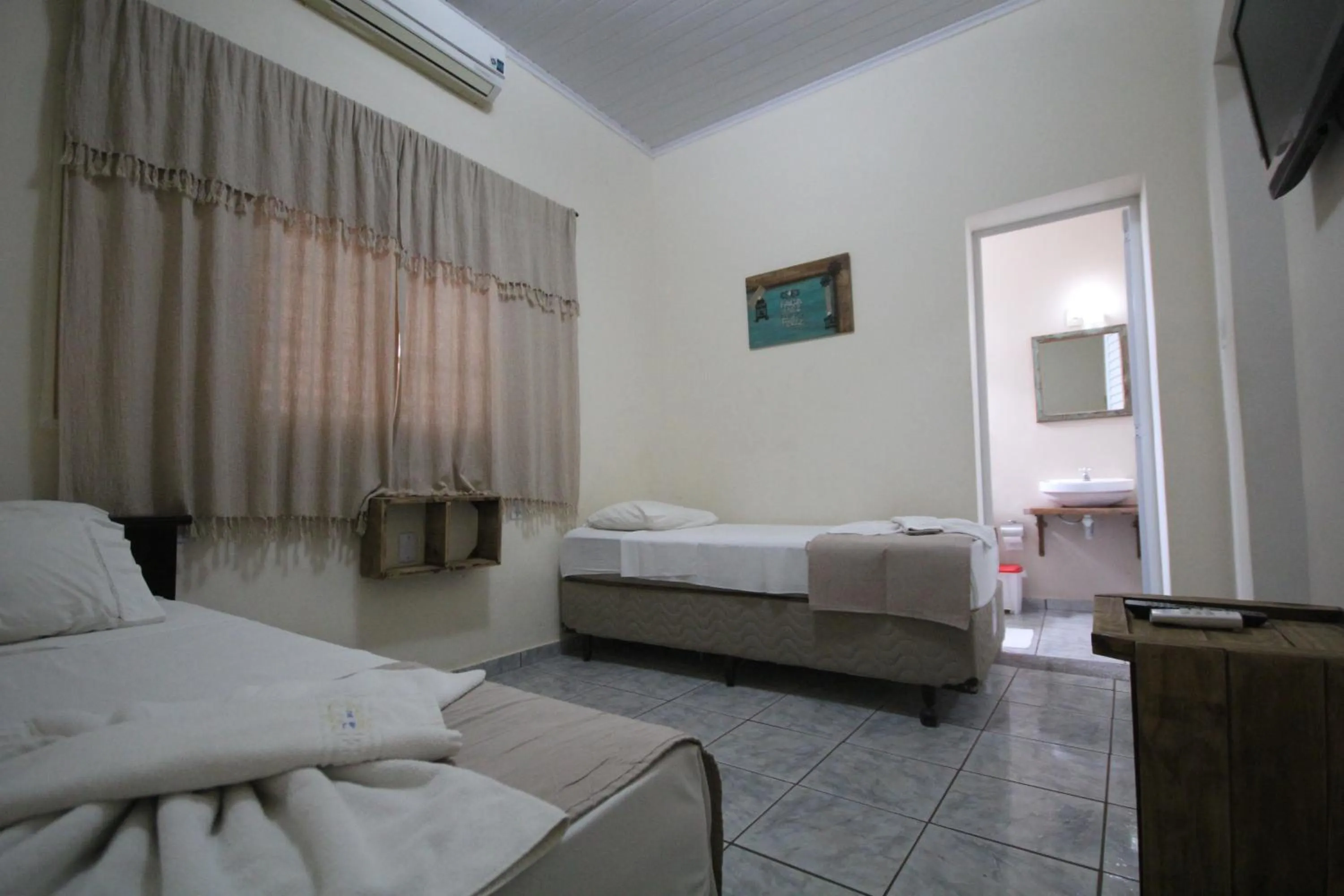 Photo of the whole room, Bed in Pousada Tia Nena