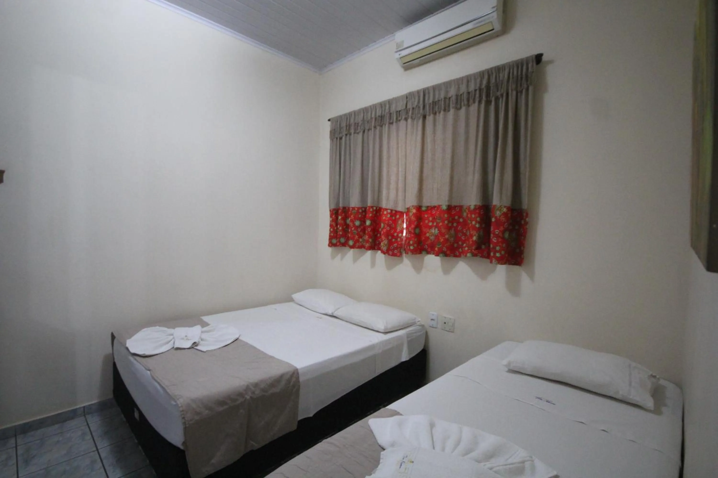 Photo of the whole room, Bed in Pousada Tia Nena