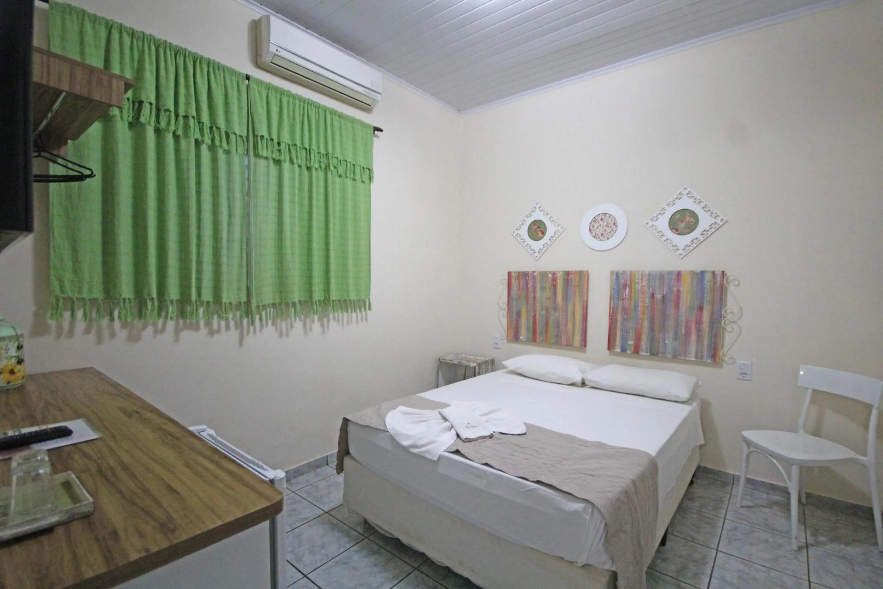 Photo of the whole room, Bed in Pousada Tia Nena