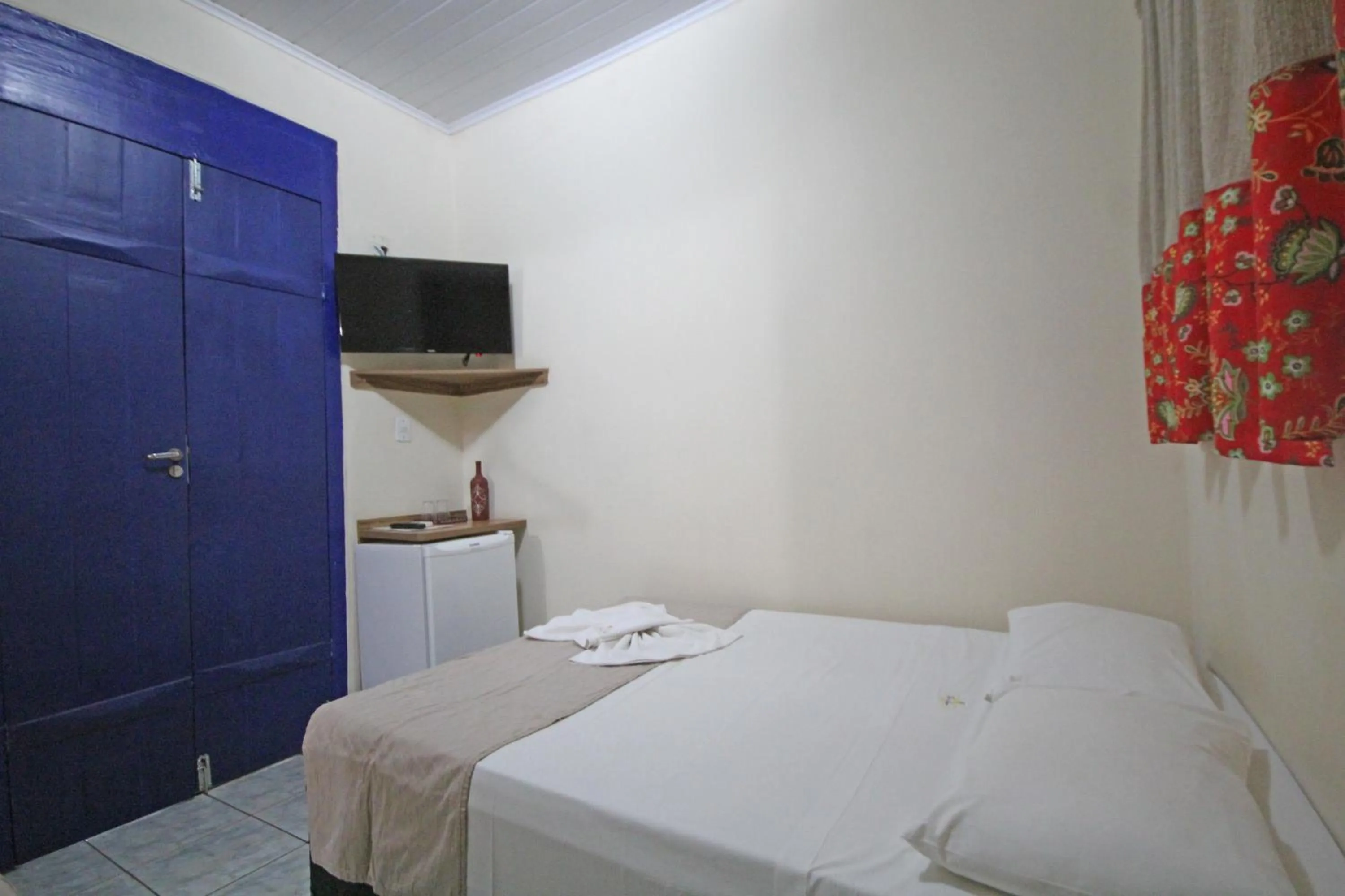 Photo of the whole room, Bed in Pousada Tia Nena