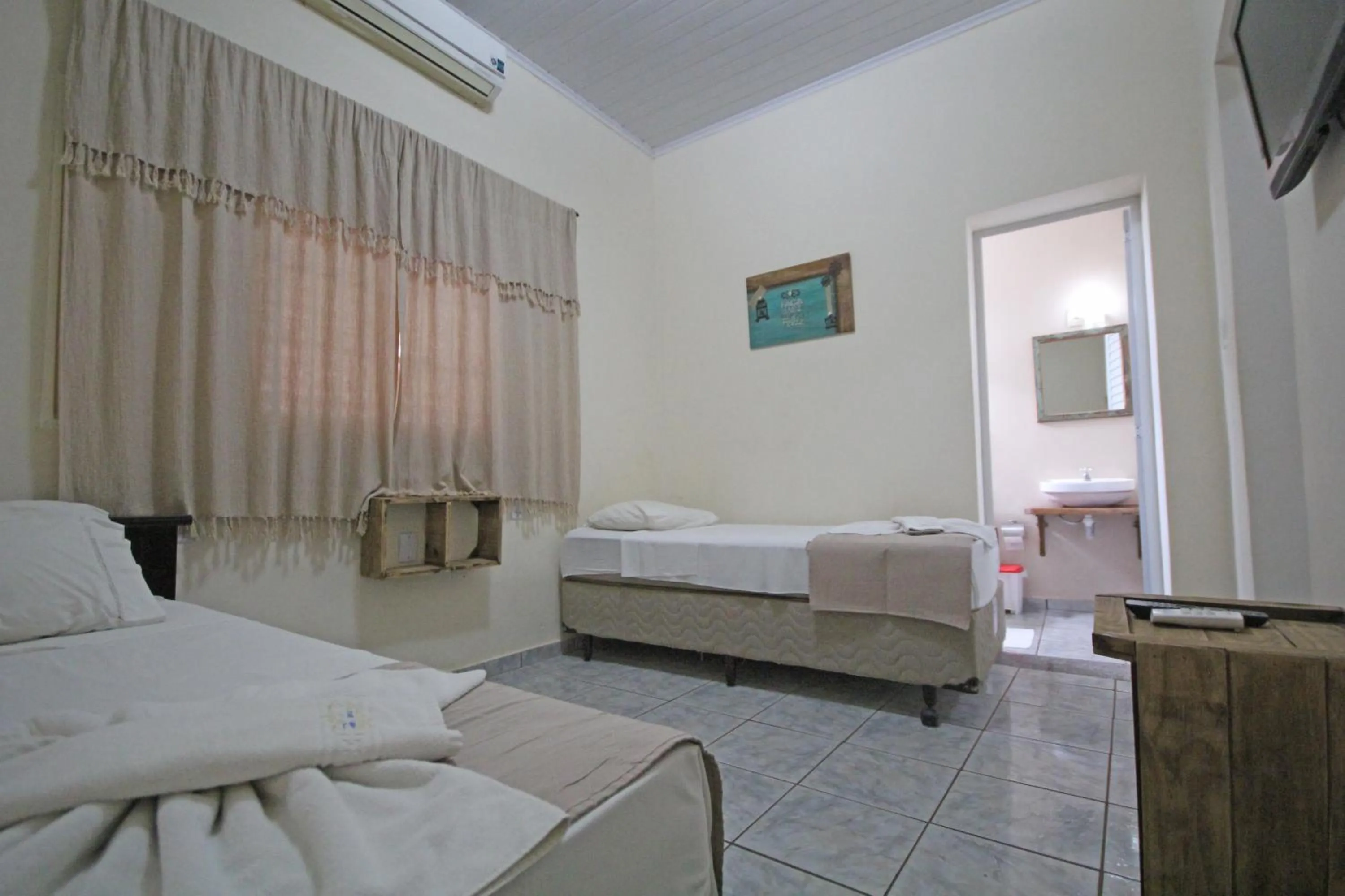 Bed in Pousada Tia Nena