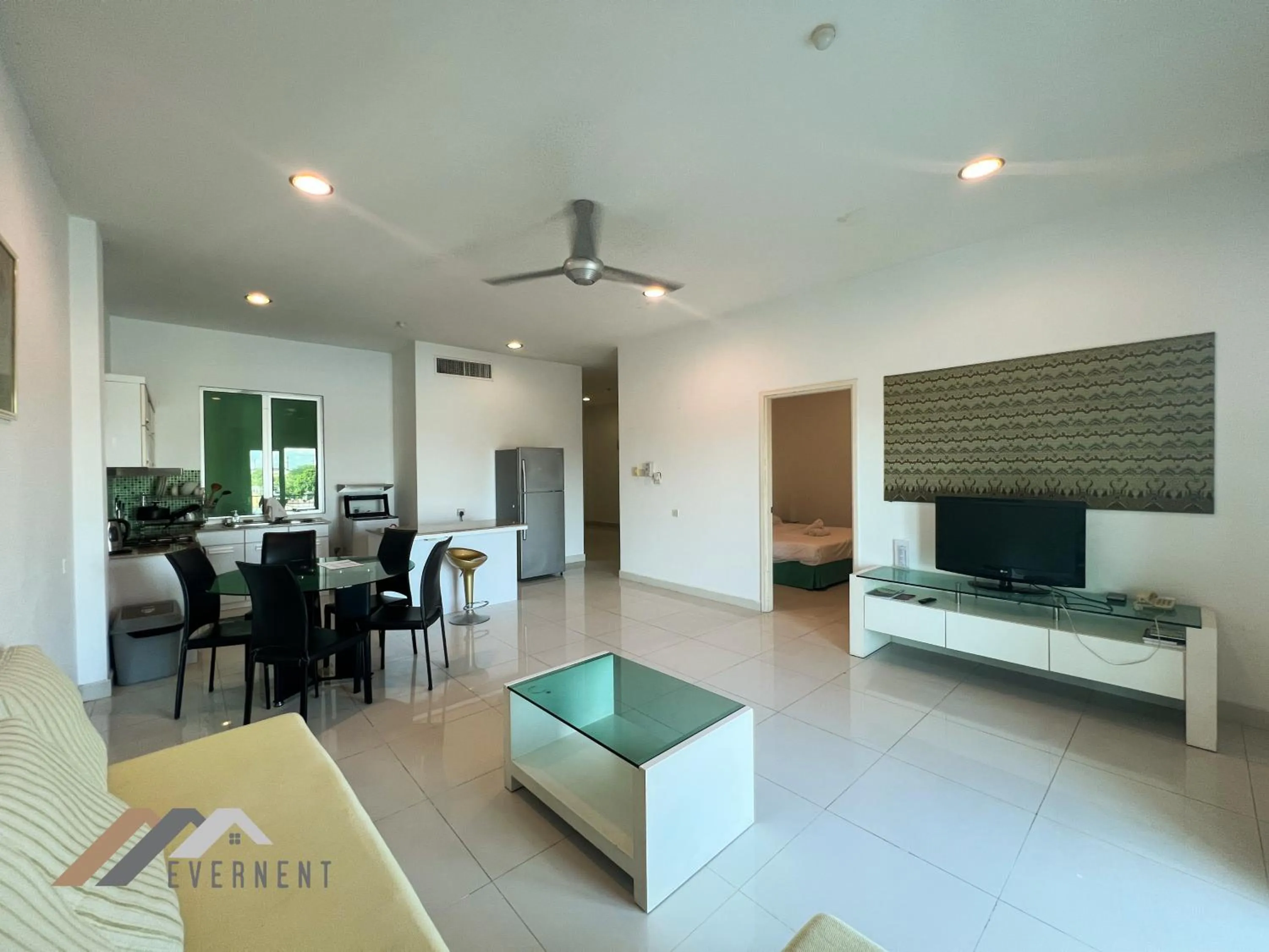 Living room in Mciti Suites by Evernent