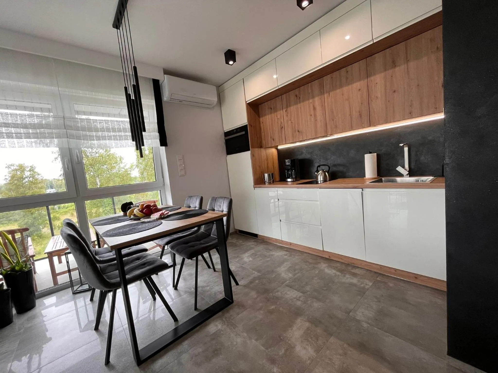 Kitchen or kitchenette in Apartament Pod Dmuchawcem