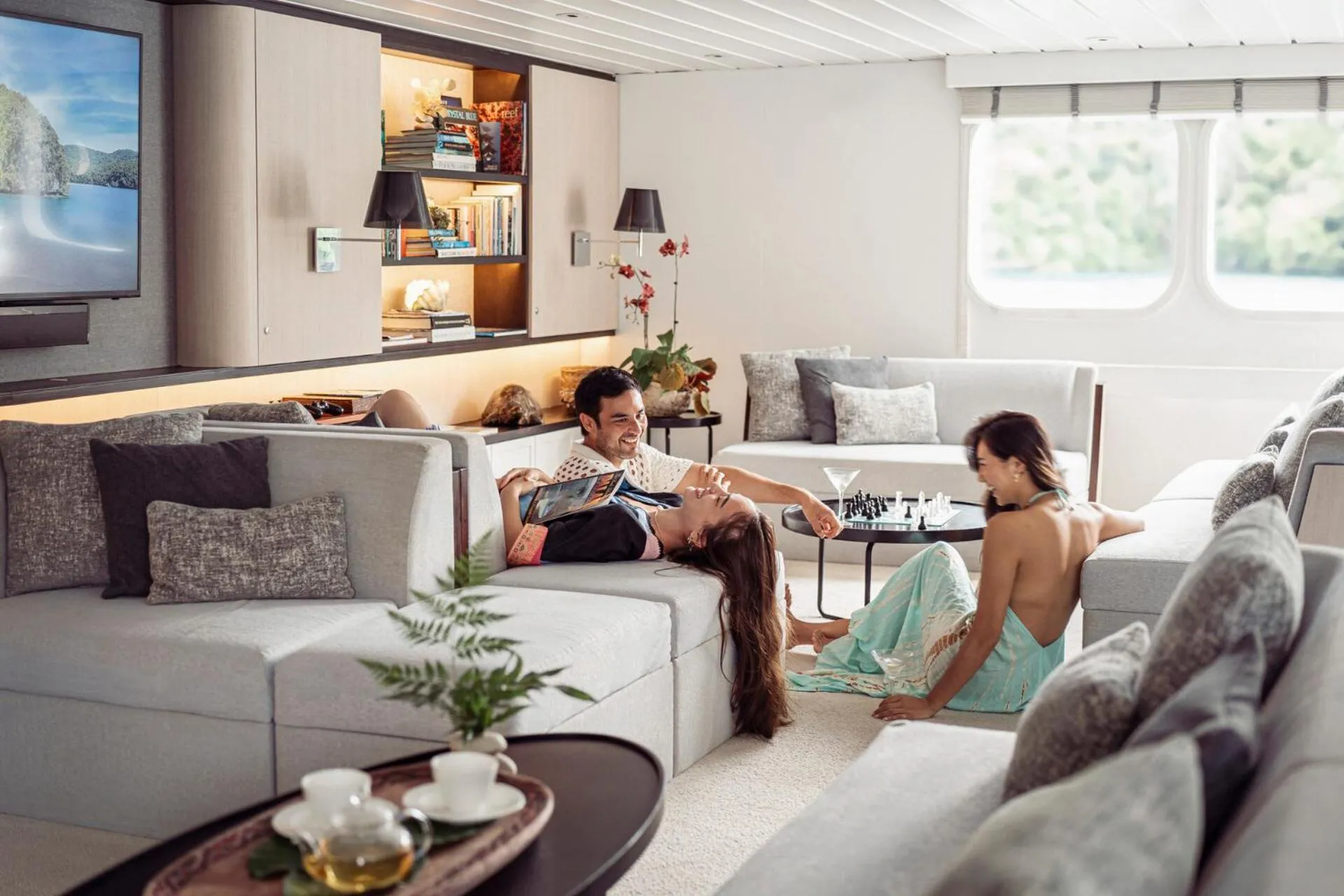 Communal lounge/ TV room in Four Seasons Explorer Palau - Cruising Resort