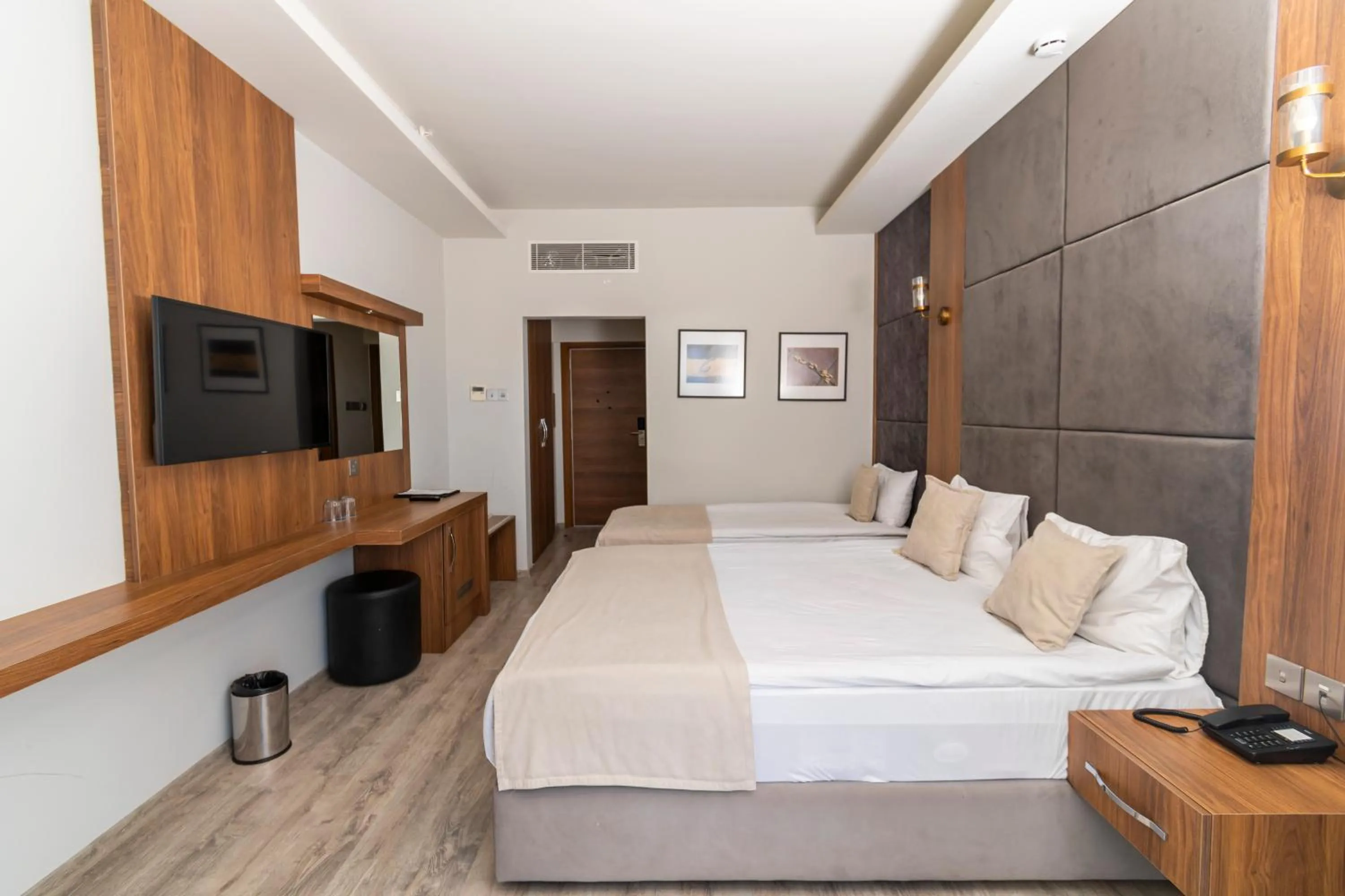 Bed in Mimoza Beach Hotel