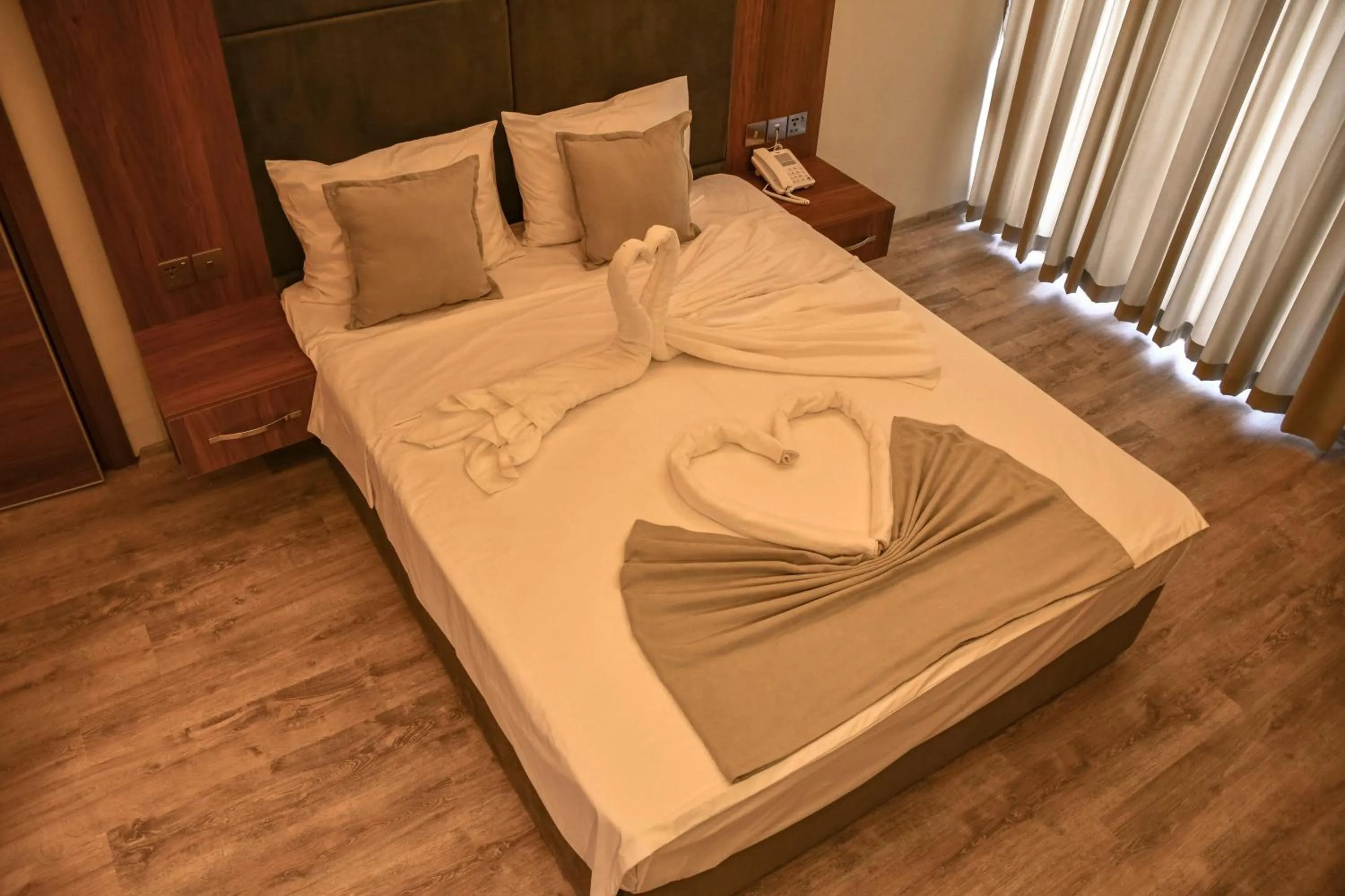 Bed in Mimoza Beach Hotel