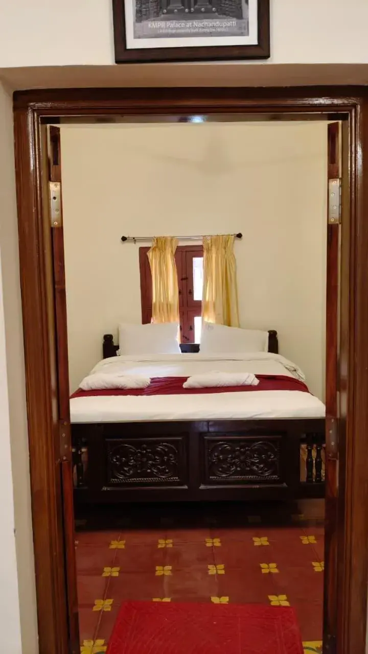 Bed in CHETTINAD HERITAGE WELLNESS RESORTS Bed in CHETTINAD HERITAGE WELLNESS RESORTS