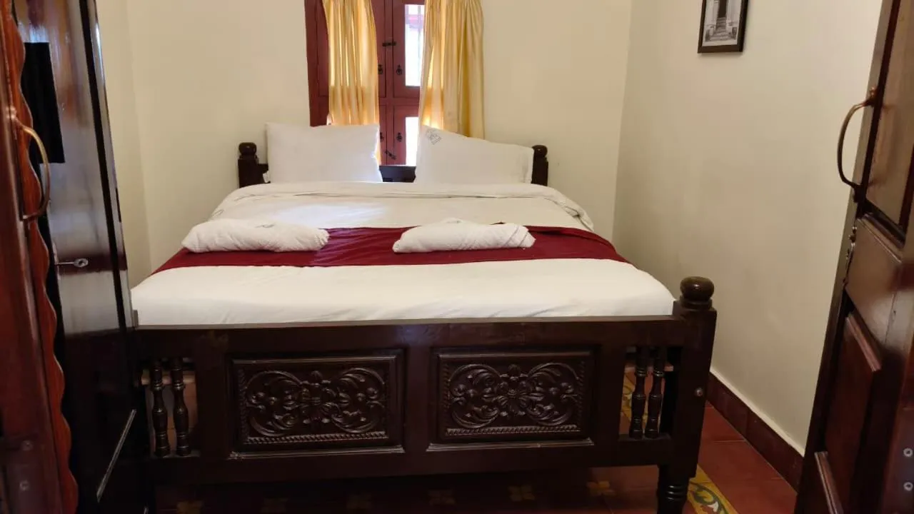 Bed in CHETTINAD HERITAGE WELLNESS RESORTS