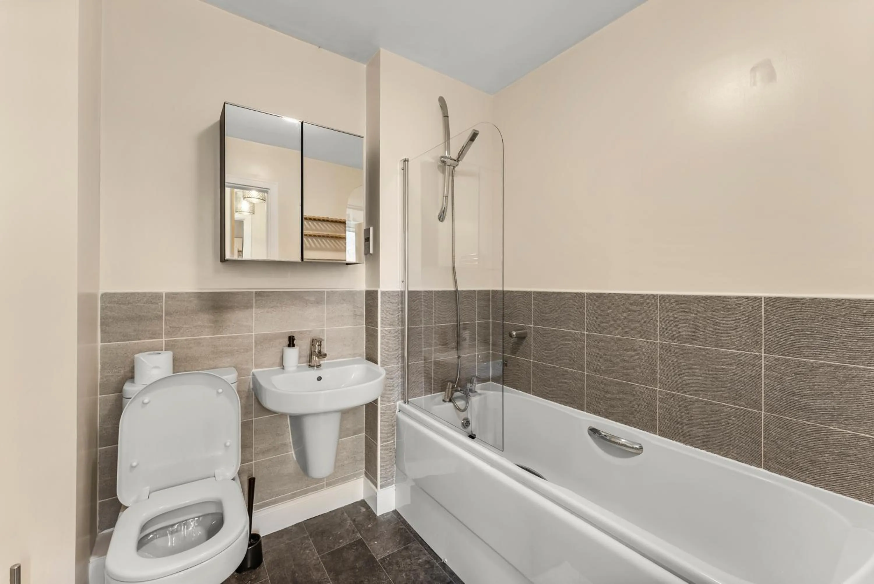 Bathroom in Sleek and Stylish 2 Bed with Garden and Parking